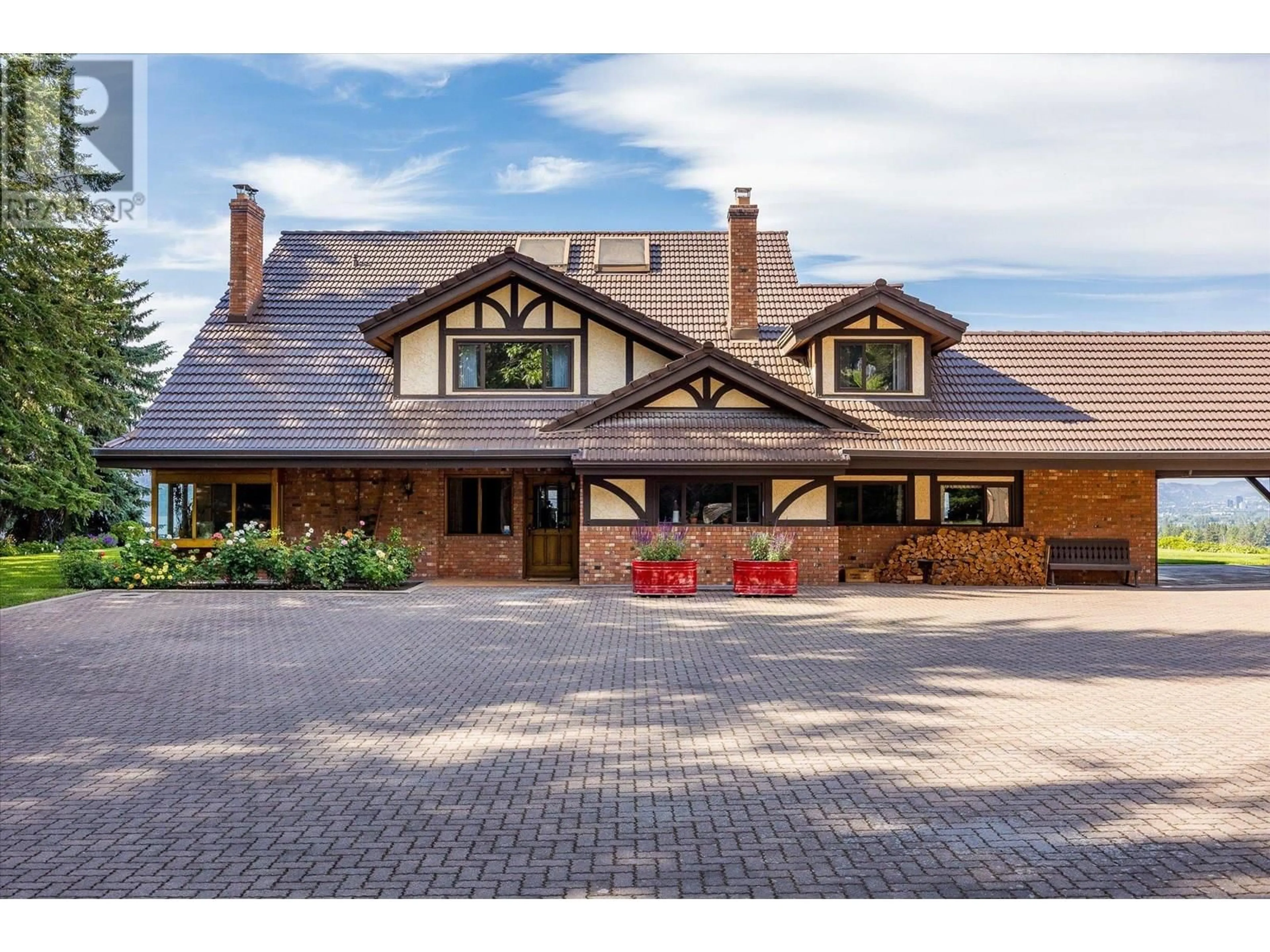 Home with brick exterior material, unknown for 4855 CHUTE LAKE ROAD, Kelowna British Columbia V1W4M3