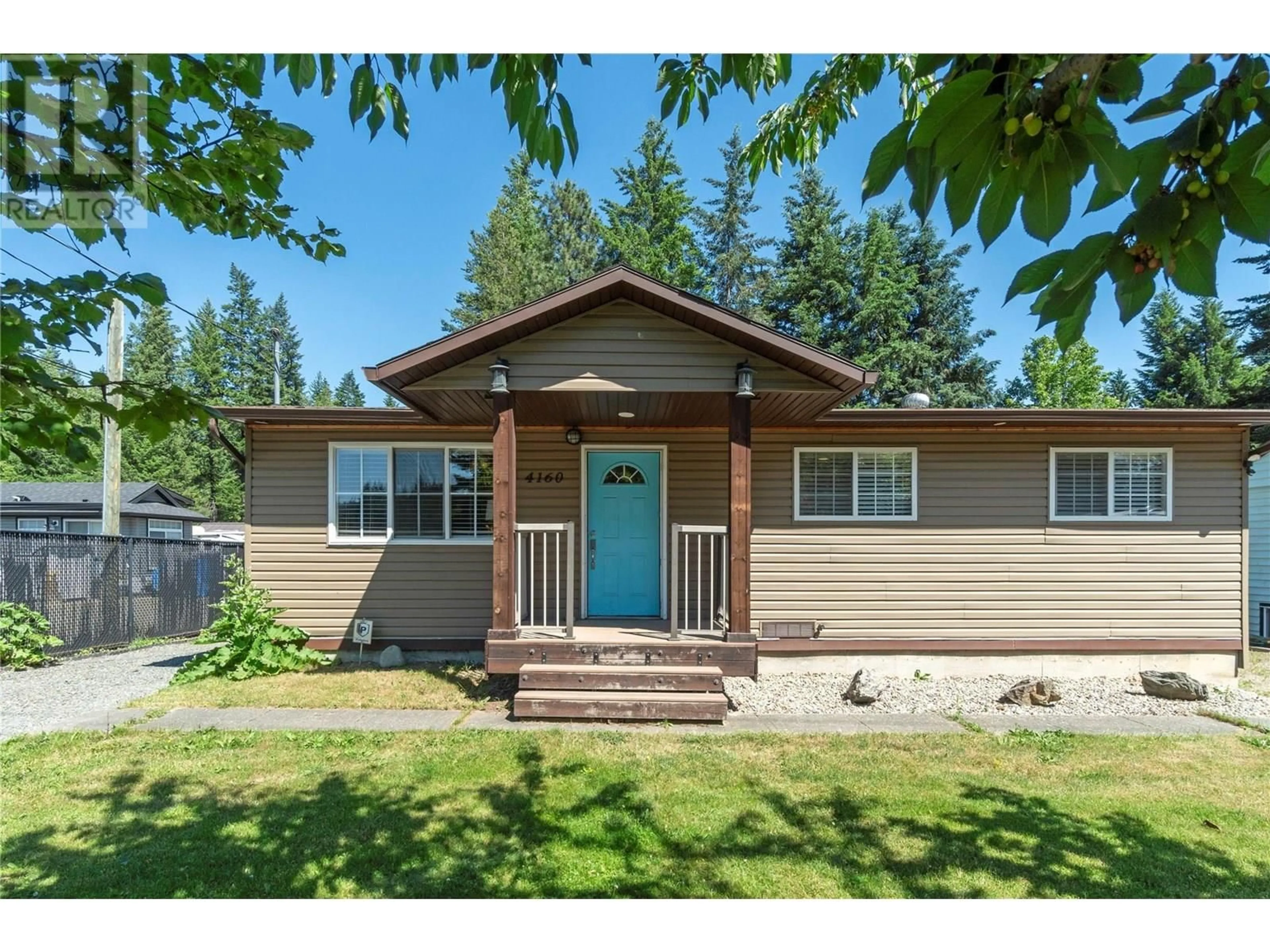 Home with vinyl exterior material, street for 4160 SQUILAX-ANGLEMONT ROAD, Scotch Creek British Columbia V0E1M5