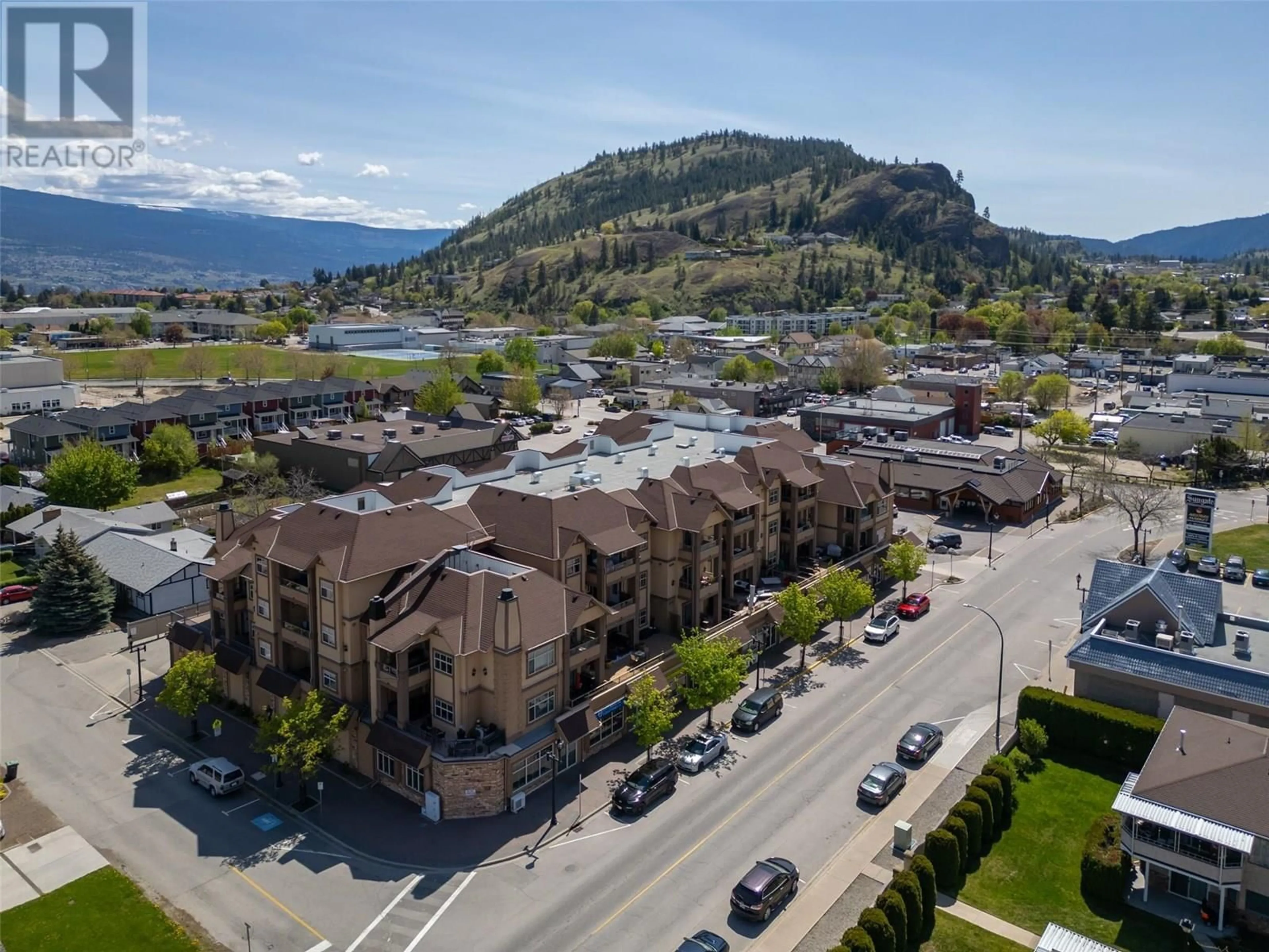 A pic from outside/outdoor area/front of a property/back of a property/a pic from drone, mountain view for 402 - 13615 VICTORIA ROAD, Summerland British Columbia V0H1Z0