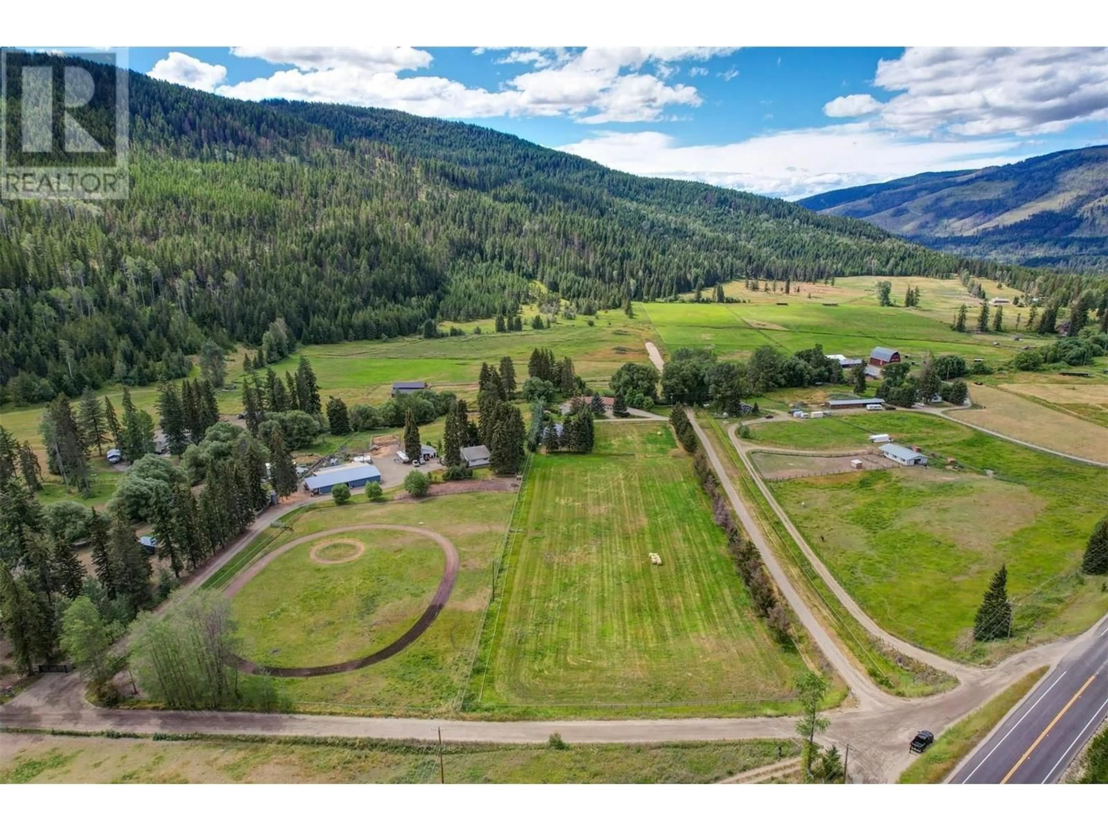 A pic from outside/outdoor area/front of a property/back of a property/a pic from drone, mountain view for 2770 SCHRAM ROAD, Kelowna British Columbia V1P1K2