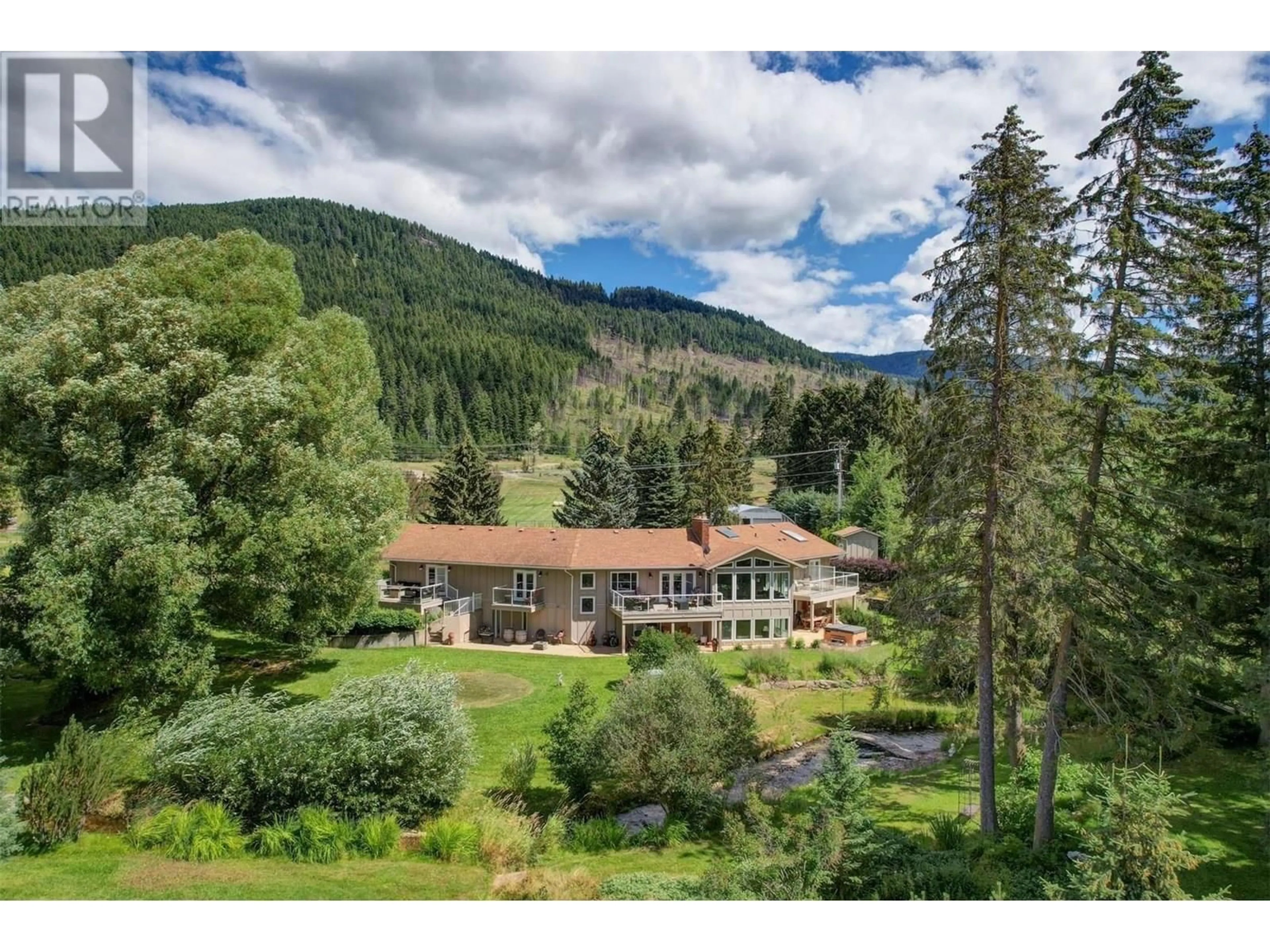 A pic from outside/outdoor area/front of a property/back of a property/a pic from drone, mountain view for 2770 SCHRAM ROAD, Kelowna British Columbia V1P1K2