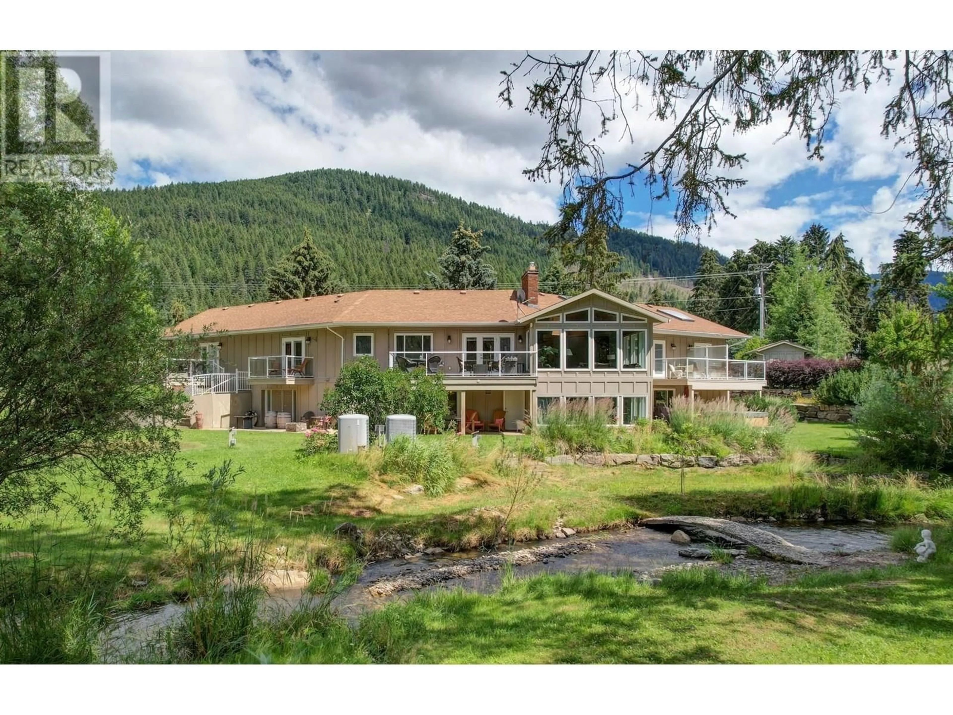 A pic from outside/outdoor area/front of a property/back of a property/a pic from drone, mountain view for 2770 SCHRAM ROAD, Kelowna British Columbia V1P1K2