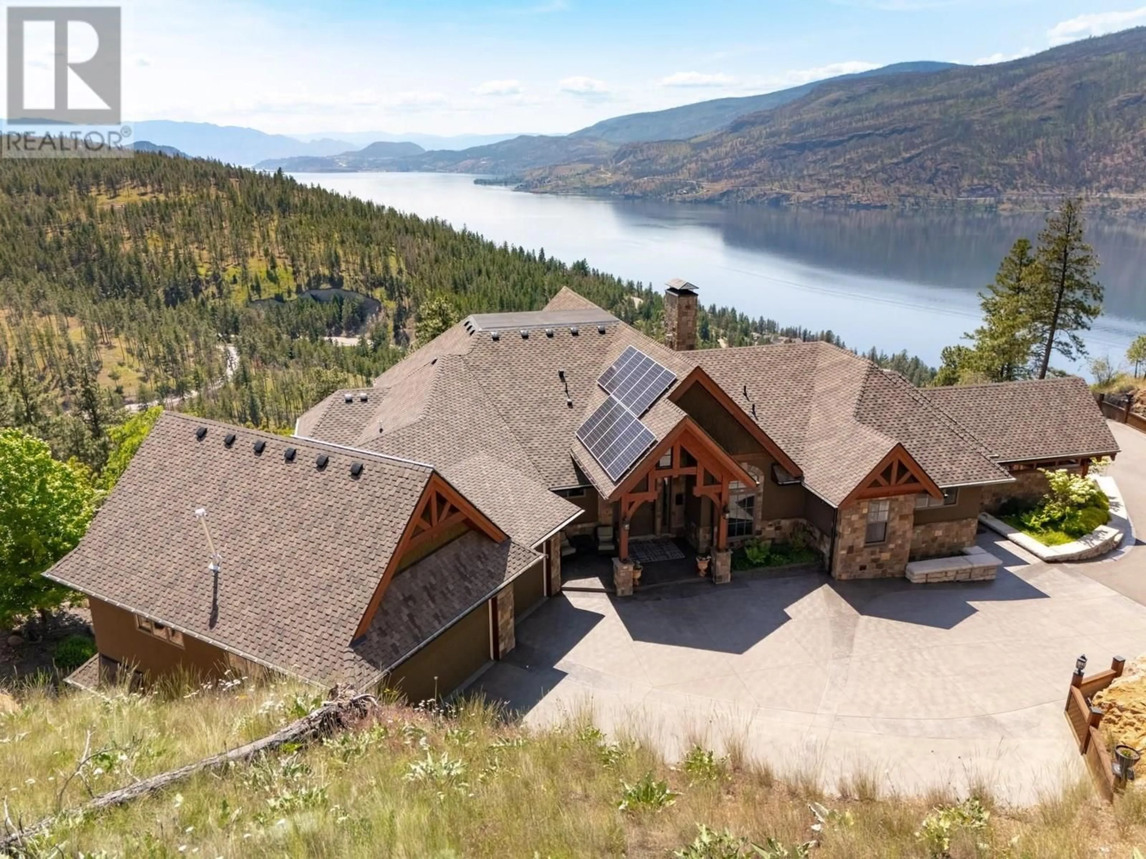 A pic from outside/outdoor area/front of a property/back of a property/a pic from drone, water/lake/river/ocean view for 1710 SHAYLER PLACE, Kelowna British Columbia V1V2R1