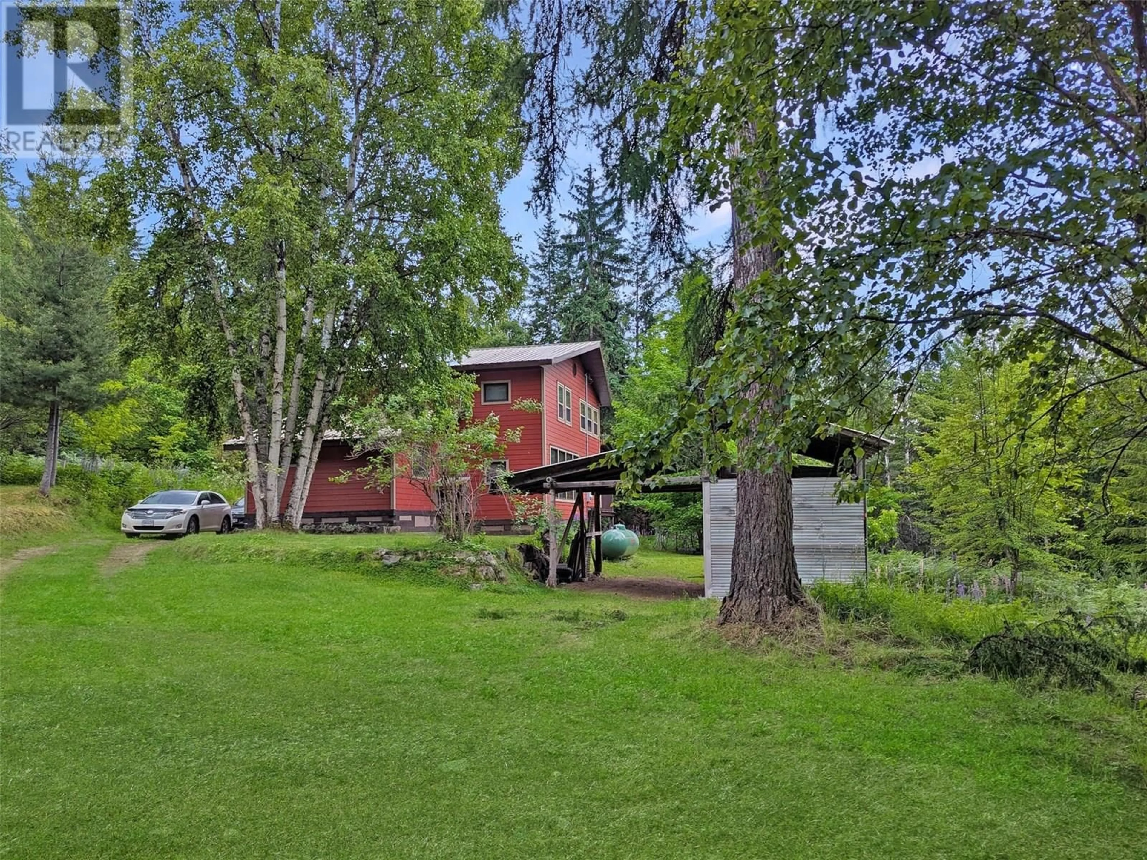 A pic from outside/outdoor area/front of a property/back of a property/a pic from drone, forest/trees view for 8802 MARTENS ROAD, Slocan British Columbia V0G2C0