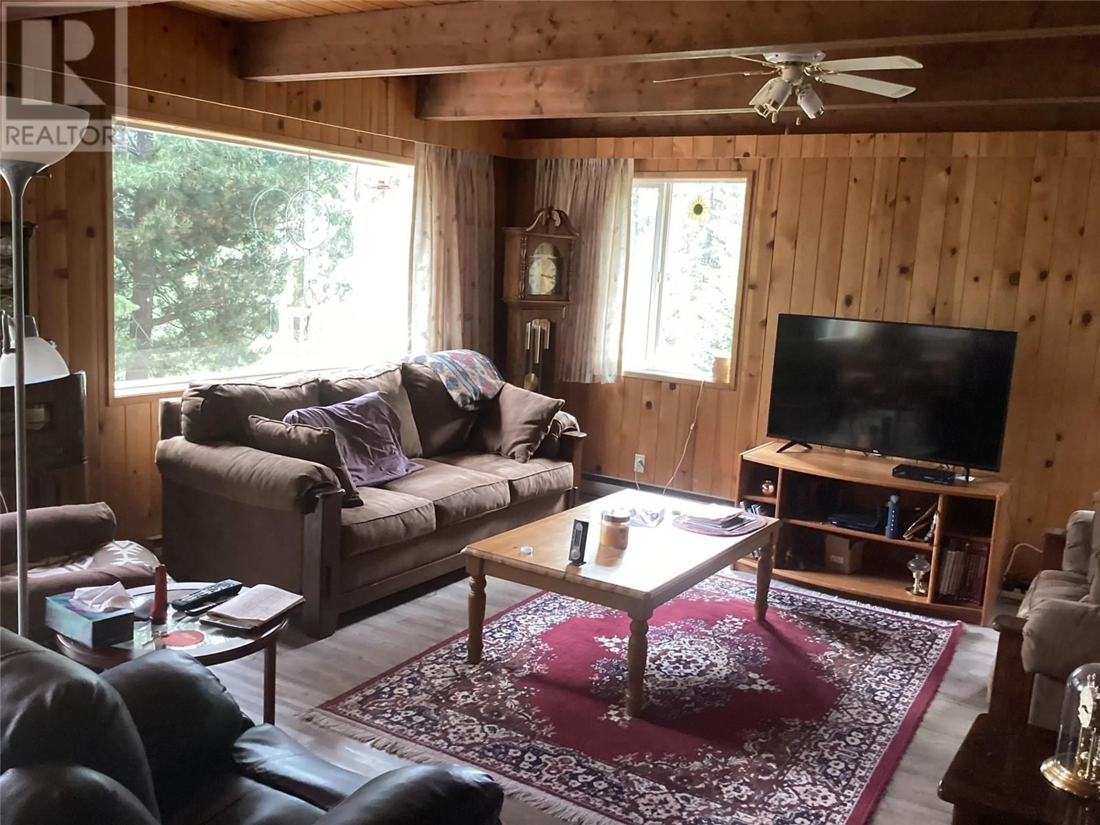 Living room with furniture, wood/laminate floor for 114 MUSKOKA ROAD, Princeton British Columbia V0X1W0
