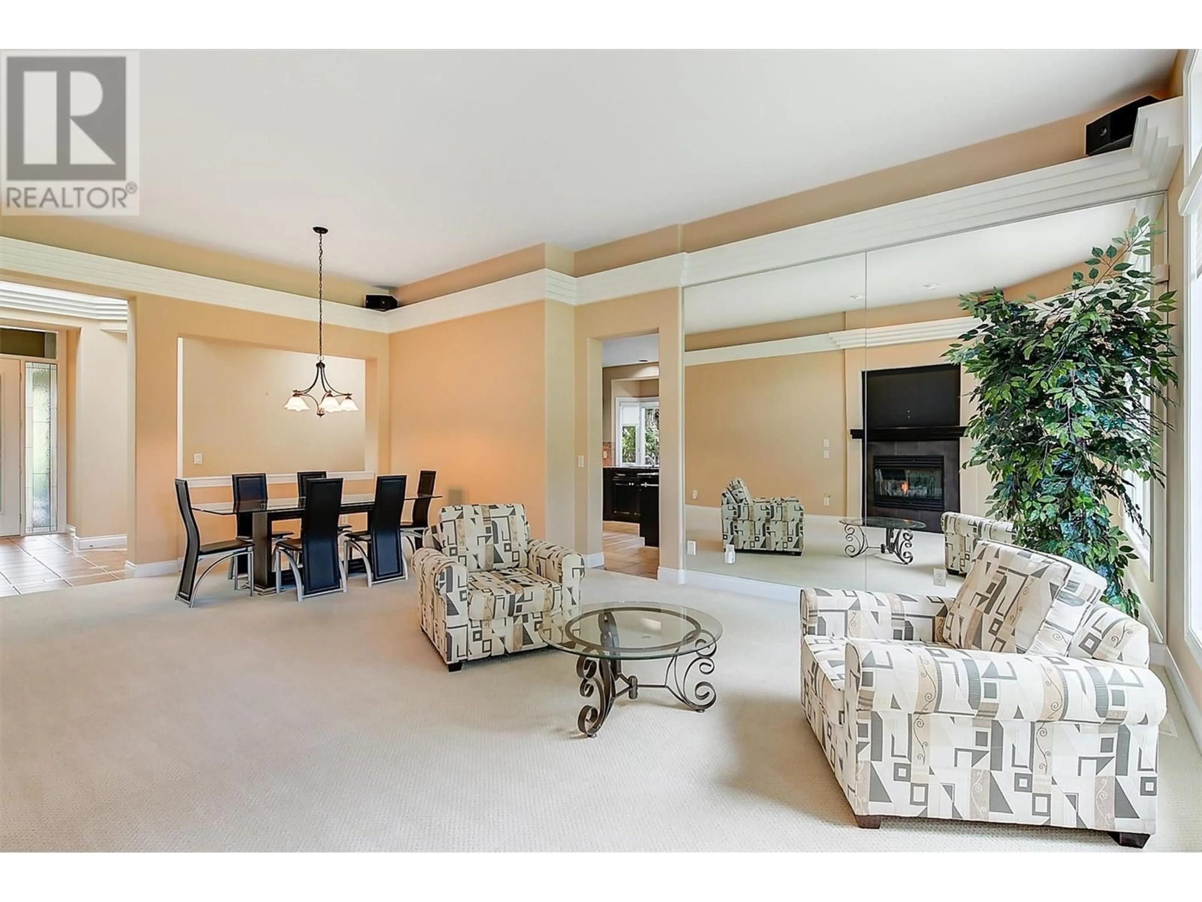 Living room with furniture, unknown for 3948 GALLAGHERS PARKWAY, Kelowna British Columbia V1W3Z9