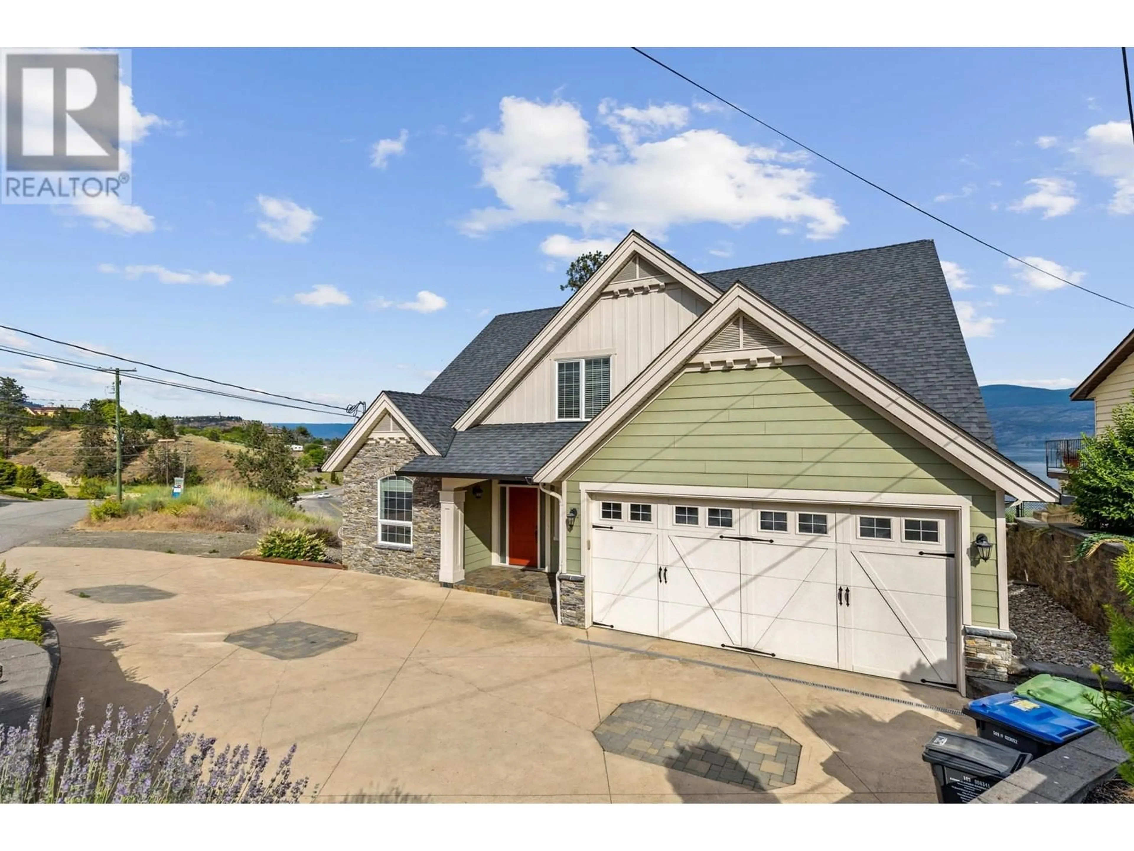 A pic from outside/outdoor area/front of a property/back of a property/a pic from drone, street for 3869 ANGUS DRIVE, West Kelowna British Columbia V4T2J8