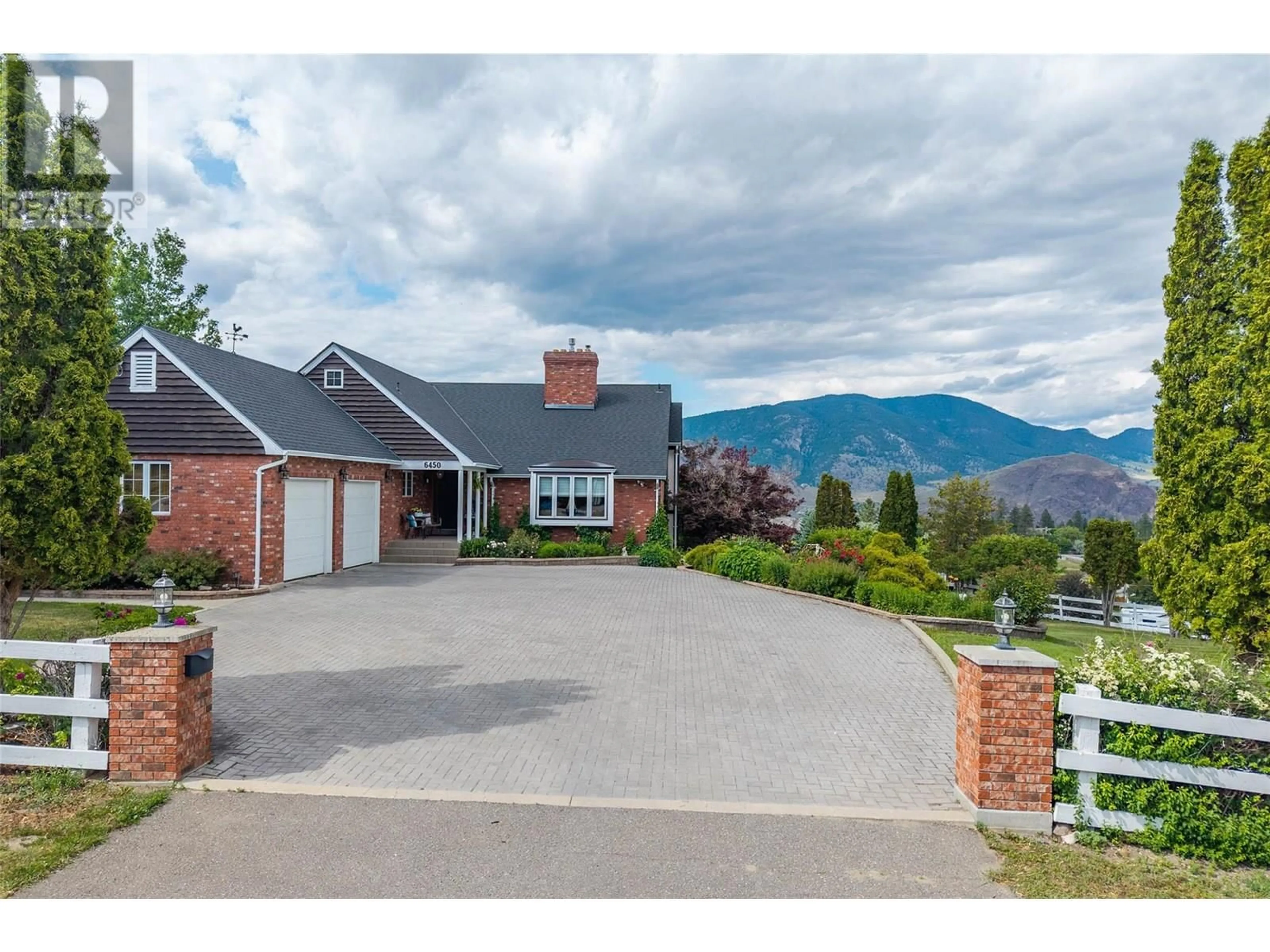 A pic from outside/outdoor area/front of a property/back of a property/a pic from drone, mountain view for 6450 MEADOWLAND CRESCENT SOUTH, Kamloops British Columbia V2C6X3