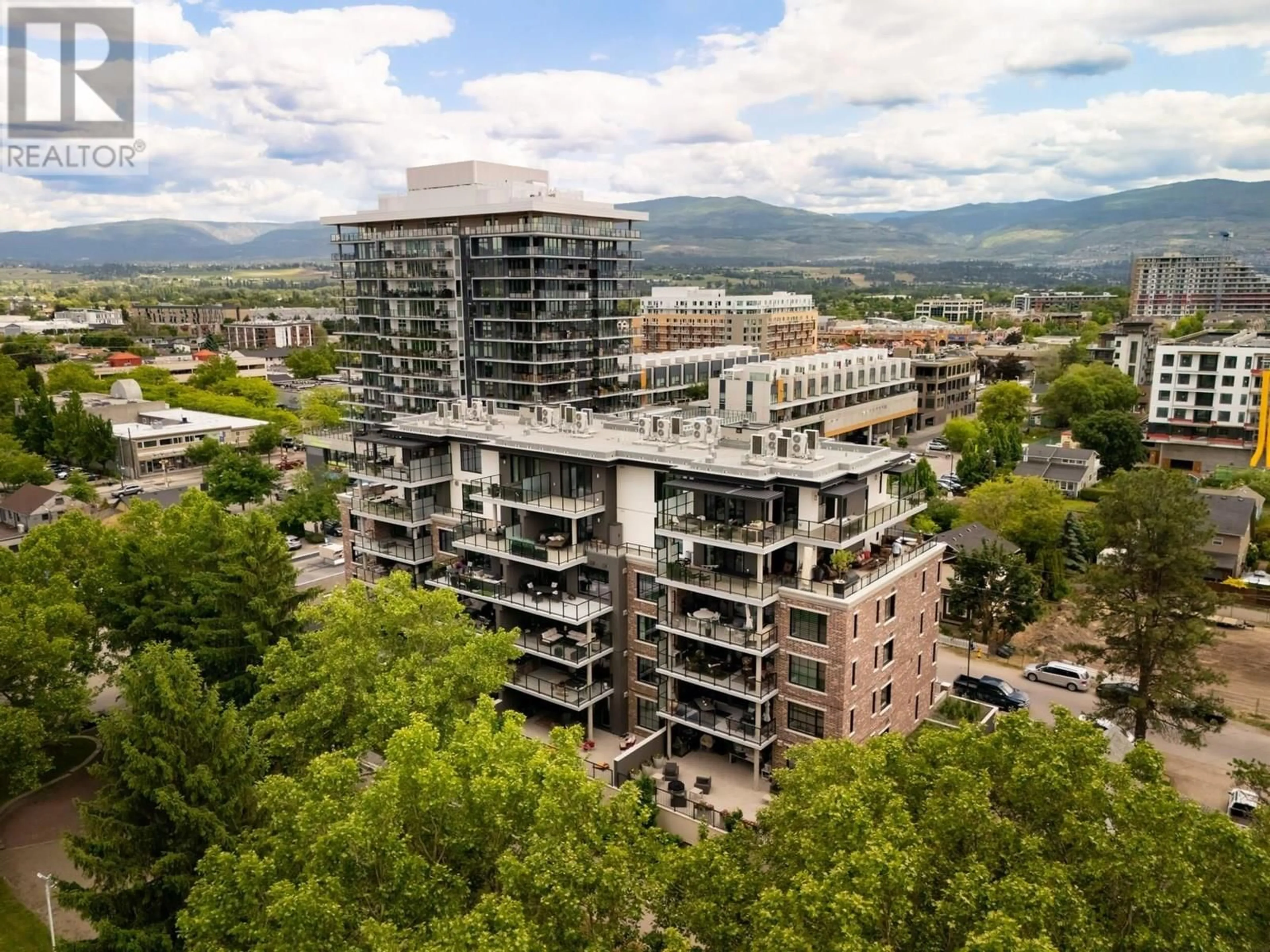 A pic from outside/outdoor area/front of a property/back of a property/a pic from drone, city buildings view from balcony for 601 - 460 GROVES AVENUE, Kelowna British Columbia V1Y4Y5