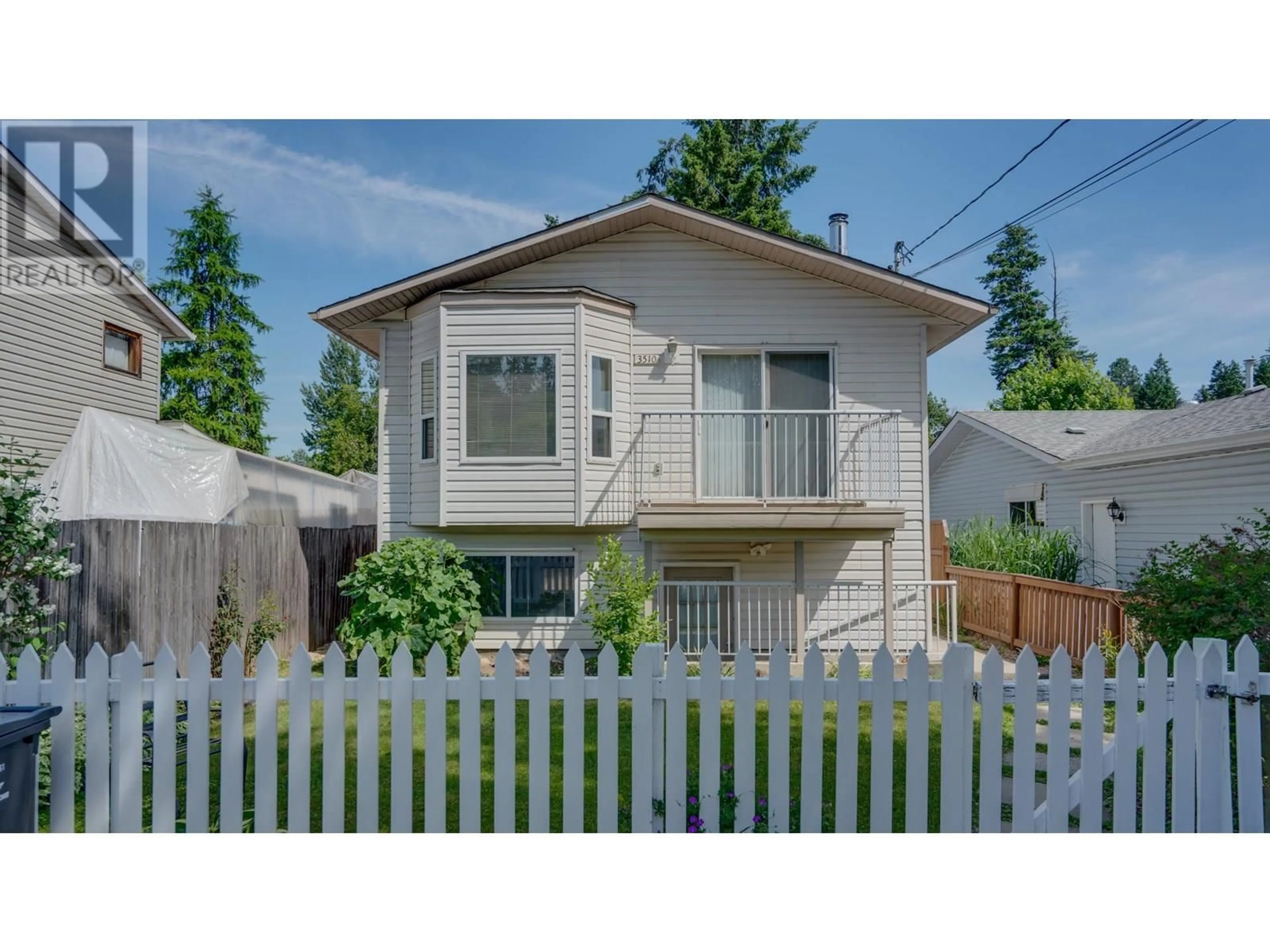 Home with vinyl exterior material, street for 3510 JACKSON AVENUE, Armstrong British Columbia V0E1B2
