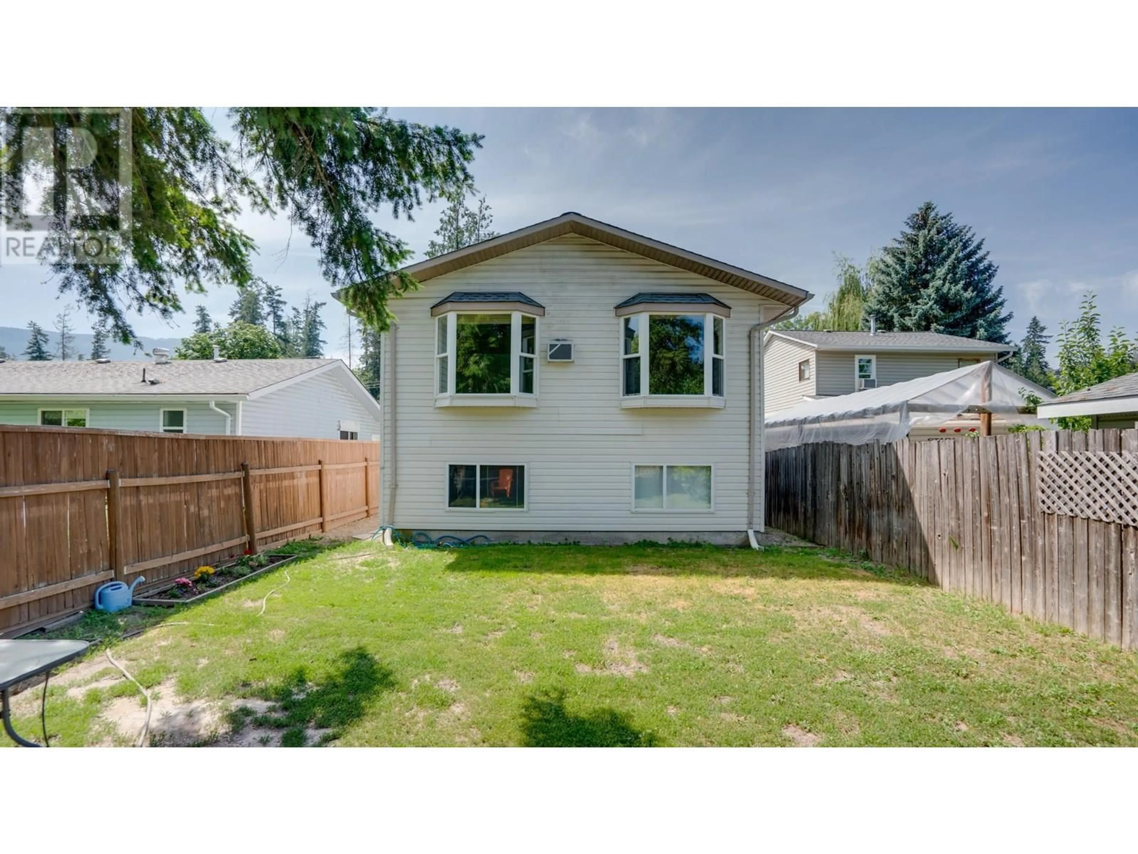 Home with vinyl exterior material, street for 3510 JACKSON AVENUE, Armstrong British Columbia V0E1B2