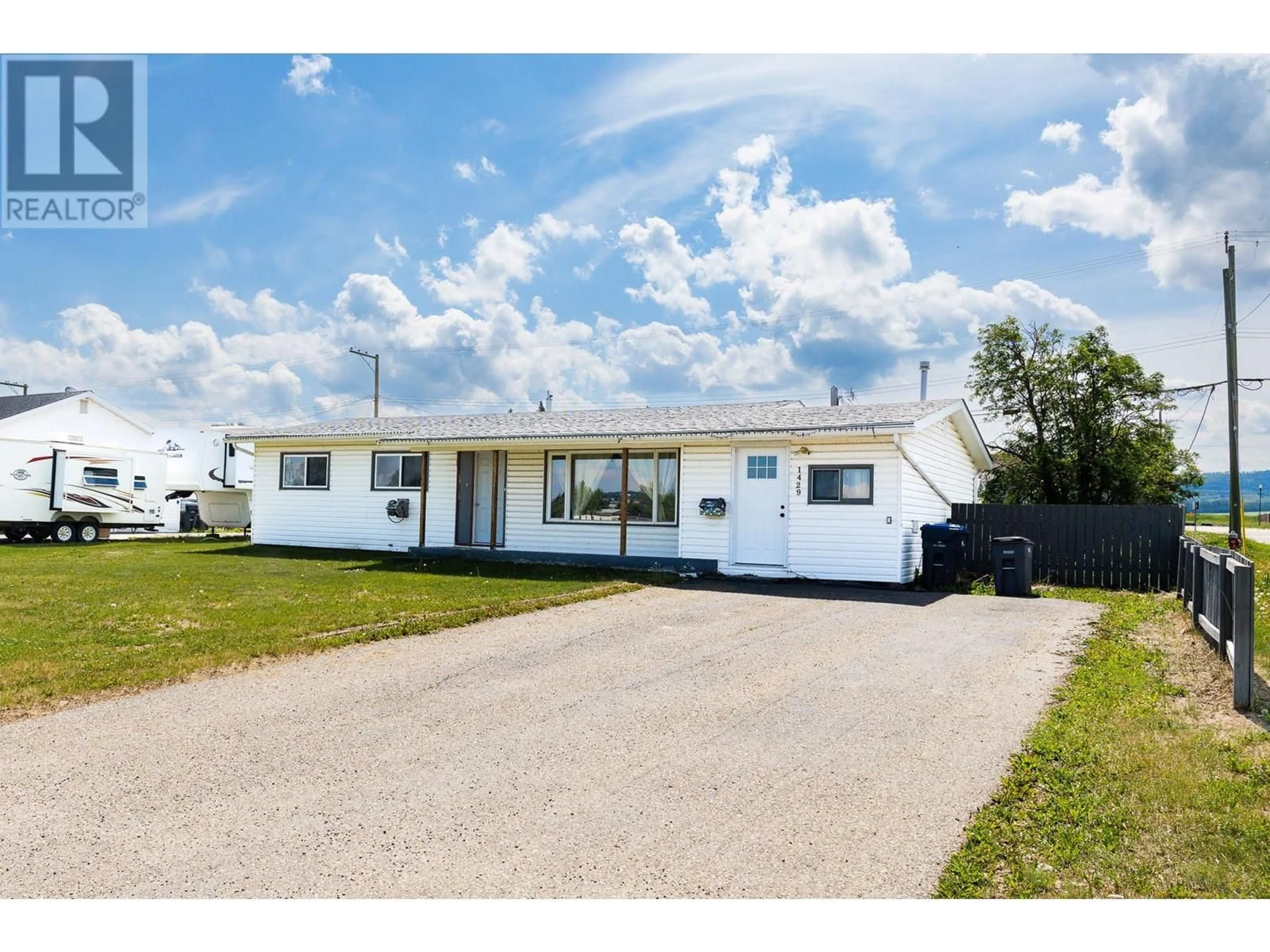 A pic from outside/outdoor area/front of a property/back of a property/a pic from drone, street for 1429 115 AVENUE, Dawson Creek British Columbia V1G3C4