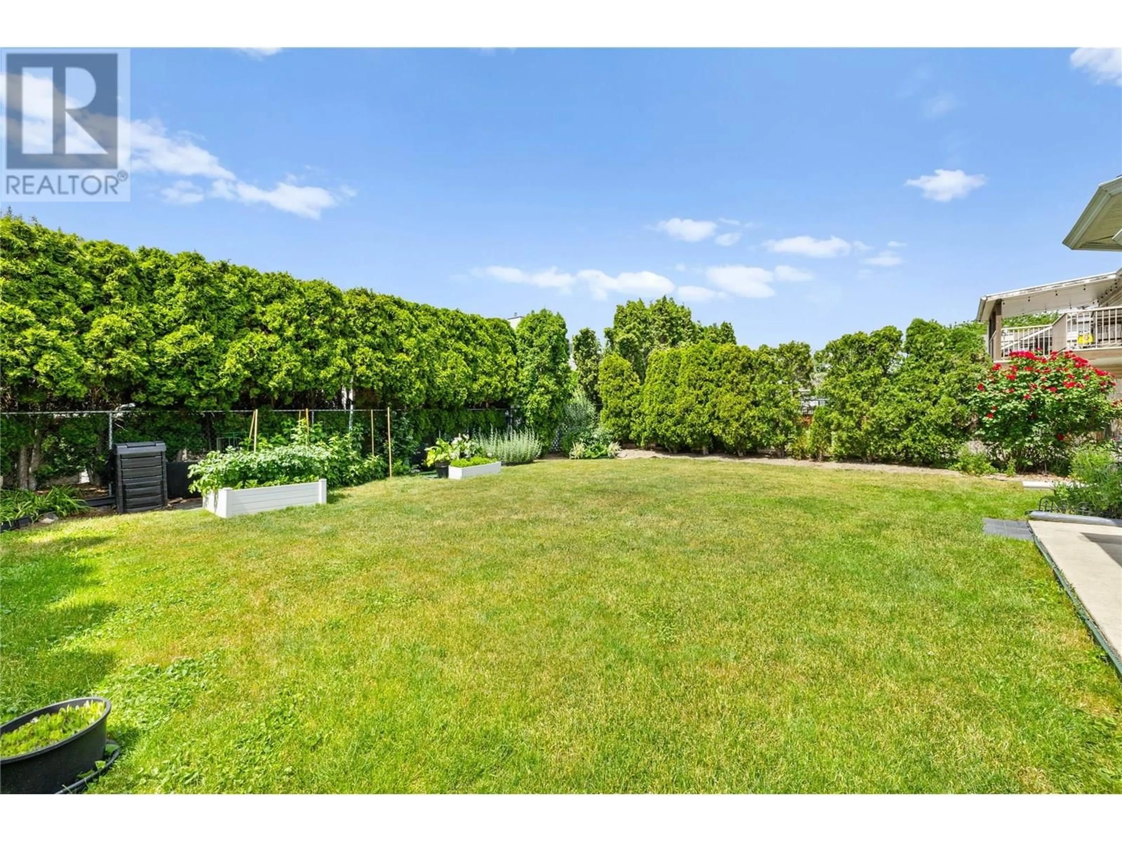 A pic from outside/outdoor area/front of a property/back of a property/a pic from drone, forest/trees view for 378 MCTAVISH CRESCENT, Kelowna British Columbia V1V1P1