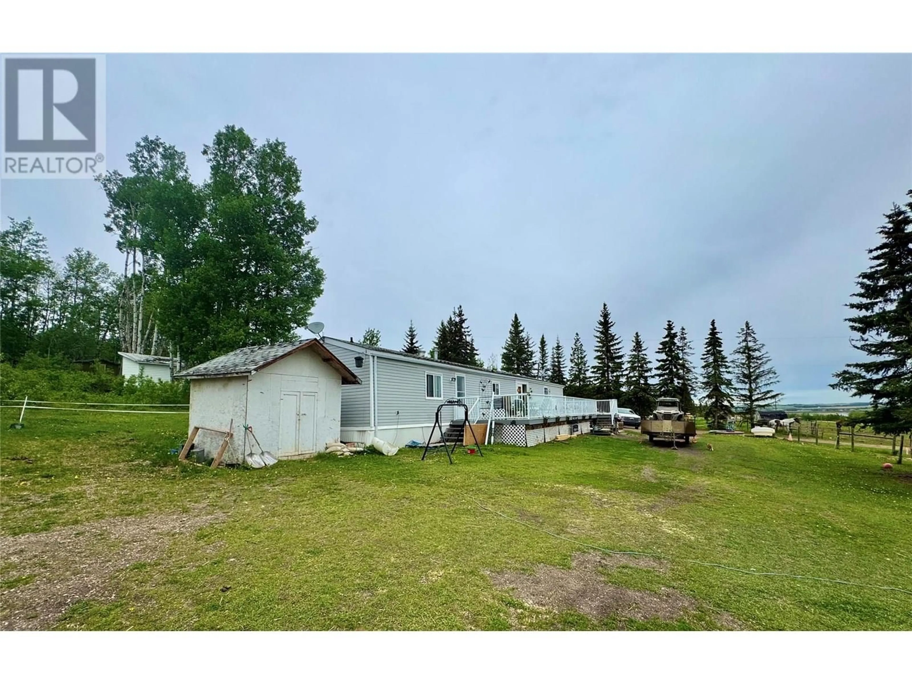 A pic from outside/outdoor area/front of a property/back of a property/a pic from drone, mountain view for 13361 213 ROAD, Dawson Creek British Columbia V0C2C0