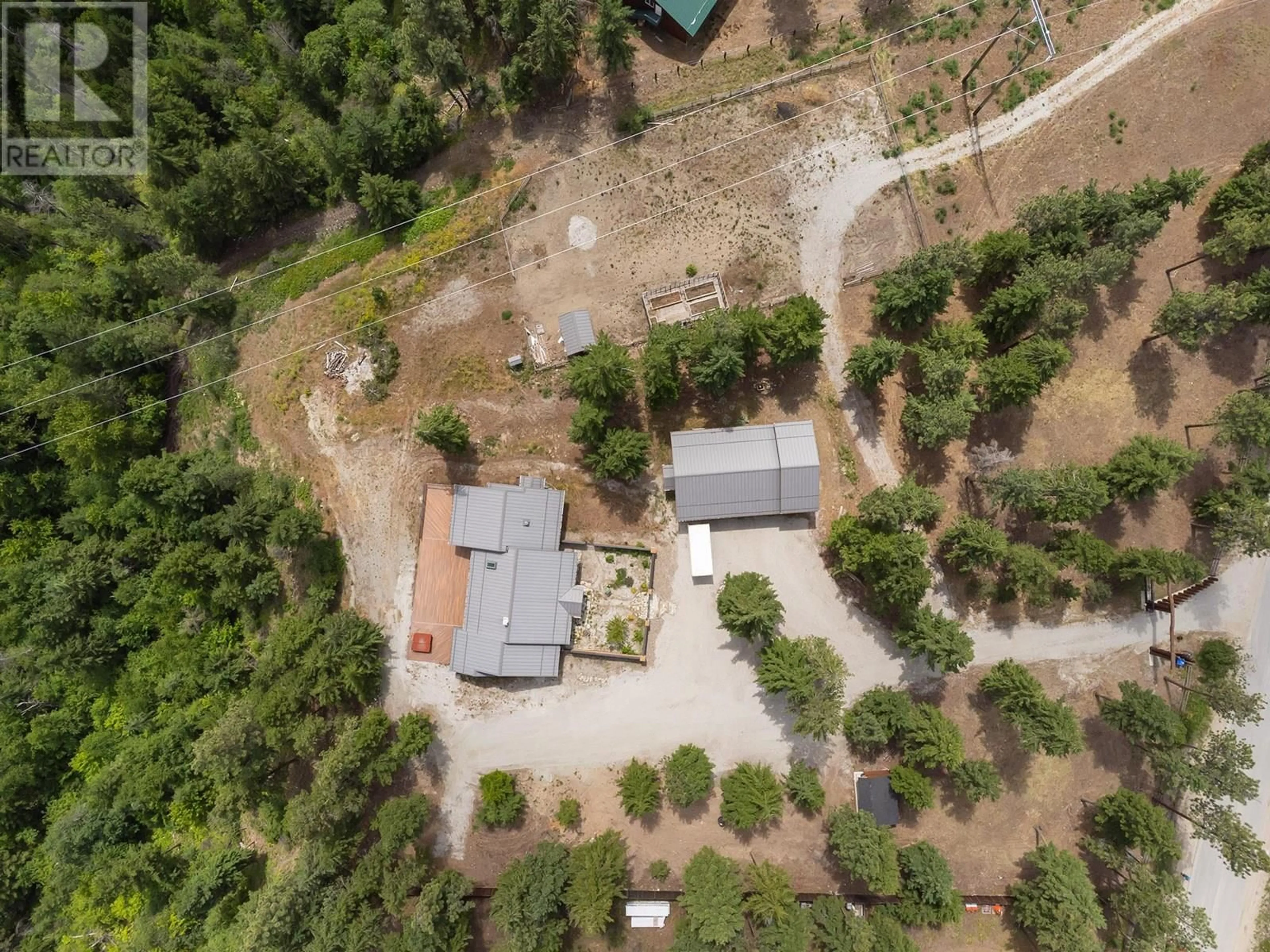 A pic from outside/outdoor area/front of a property/back of a property/a pic from drone, forest/trees view for 4335 MAXWELL ROAD, Peachland British Columbia V0H1X3