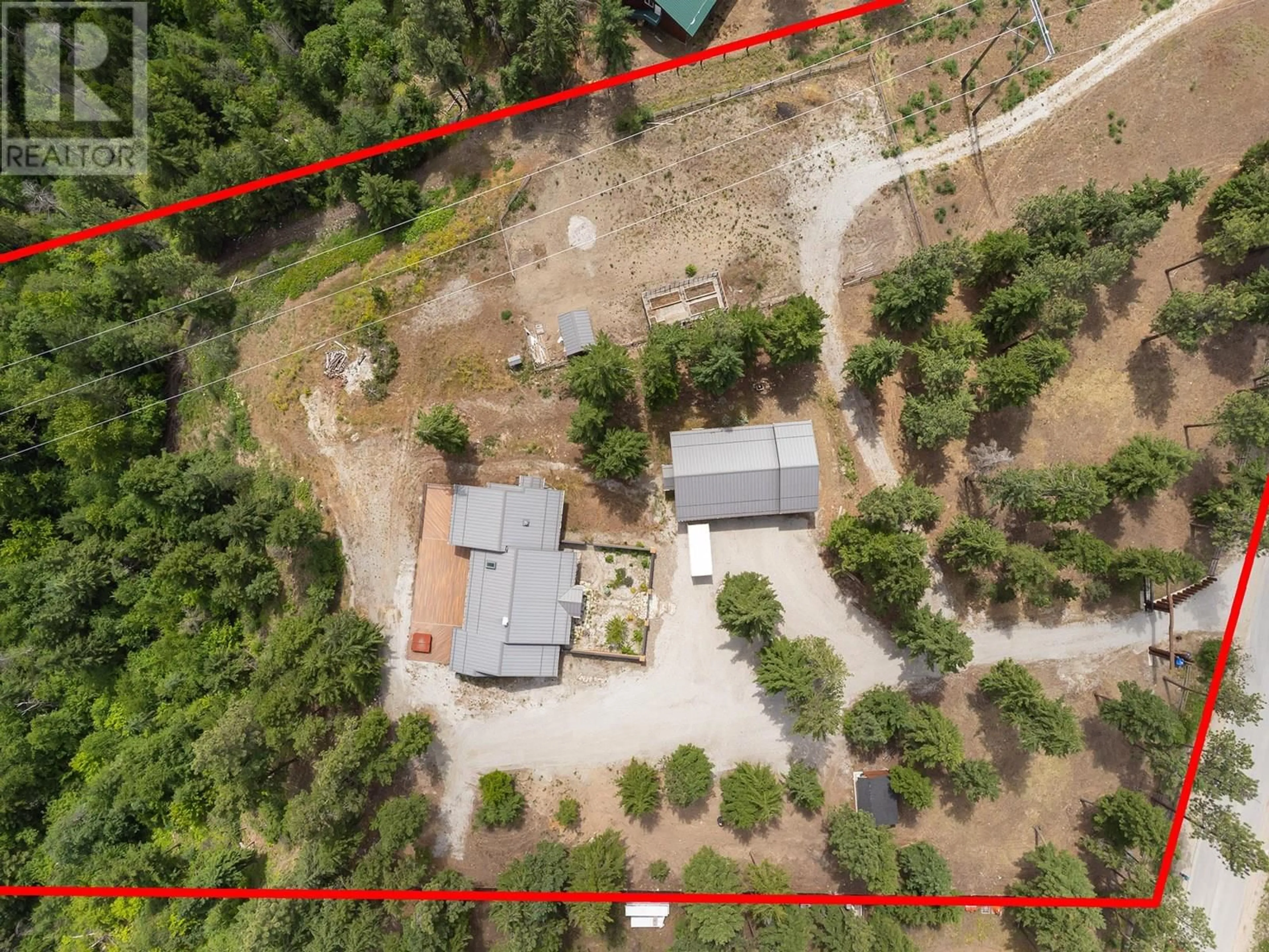 A pic from outside/outdoor area/front of a property/back of a property/a pic from drone, forest/trees view for 4335 MAXWELL ROAD, Peachland British Columbia V0H1X3
