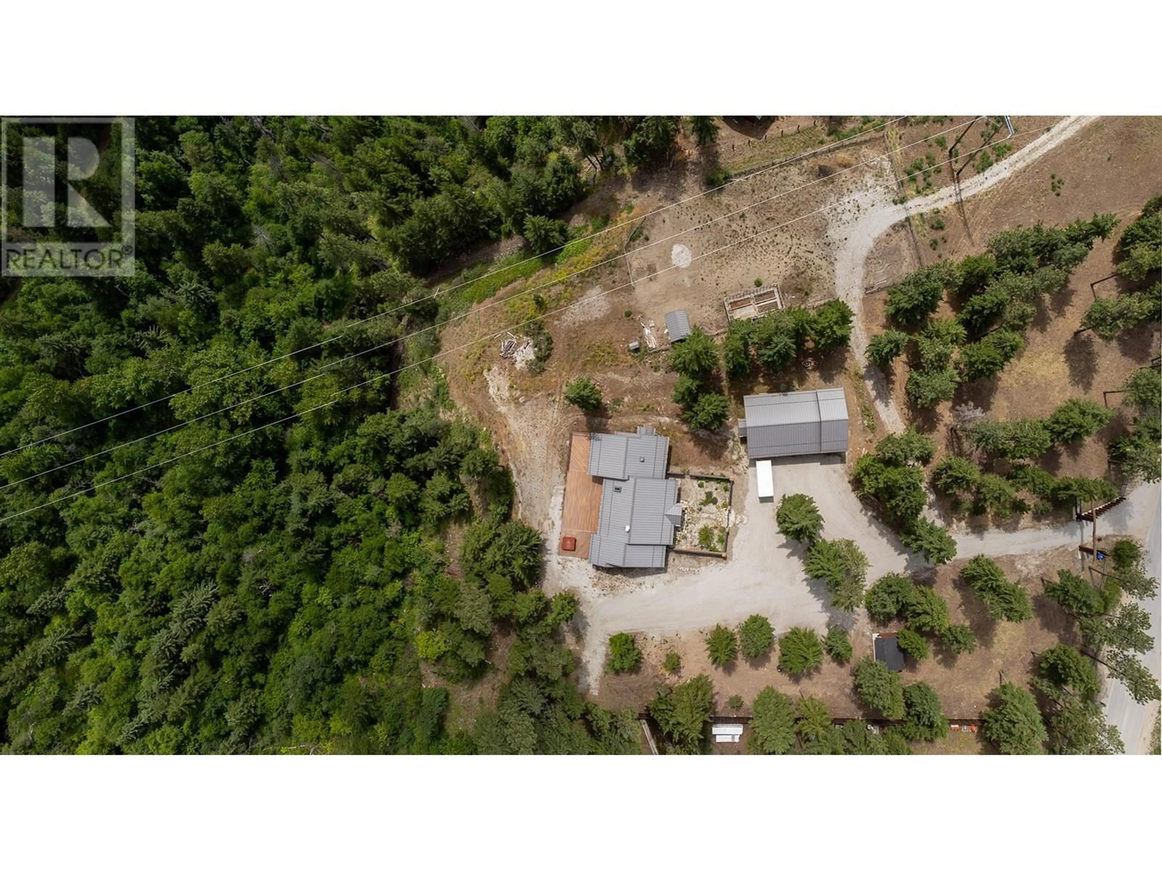 A pic from outside/outdoor area/front of a property/back of a property/a pic from drone, forest/trees view for 4335 MAXWELL ROAD, Peachland British Columbia V0H1X3
