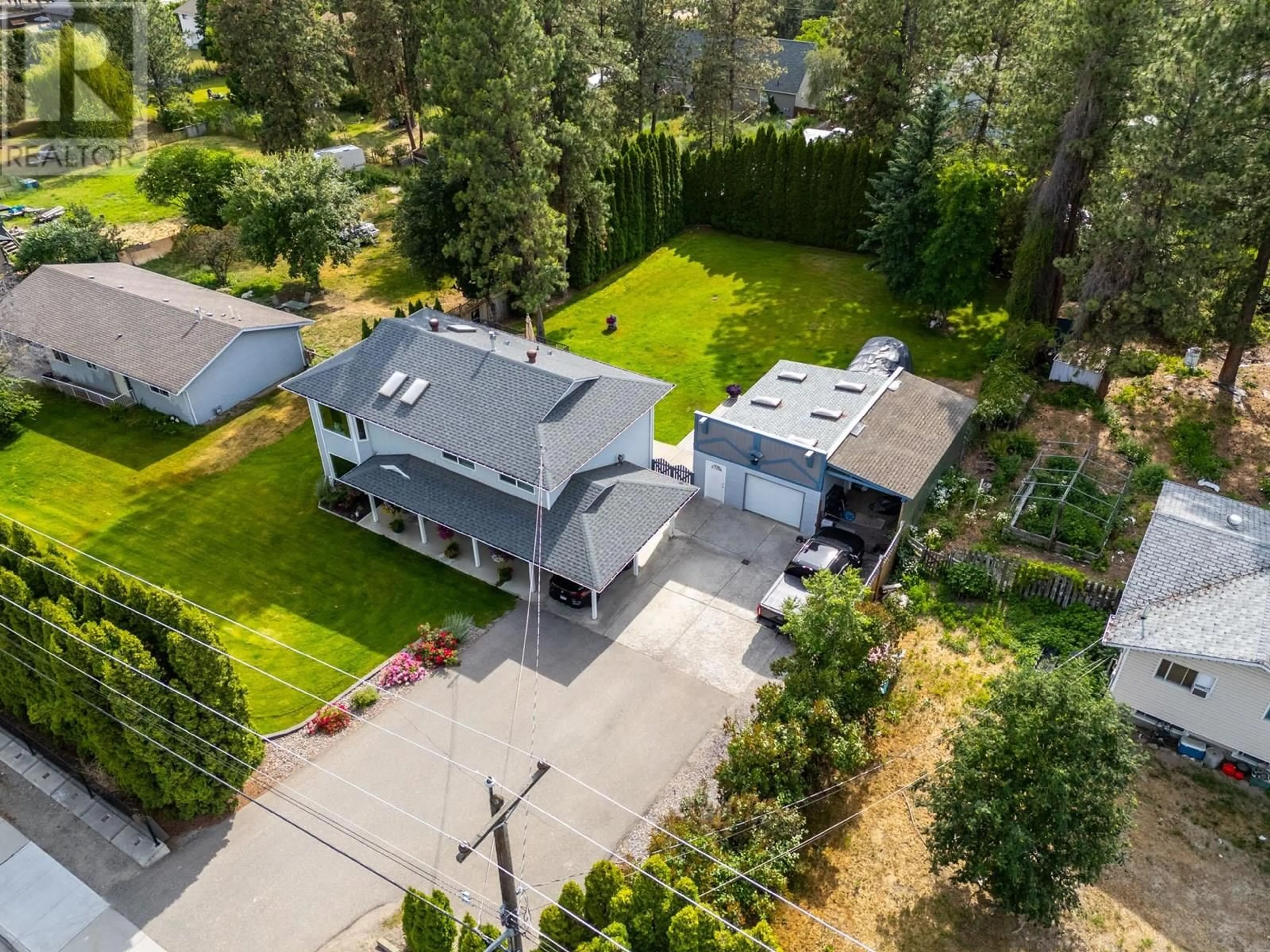 A pic from outside/outdoor area/front of a property/back of a property/a pic from drone, street for 3424 EAST BOUNDARY ROAD, Westbank British Columbia V4T2H4