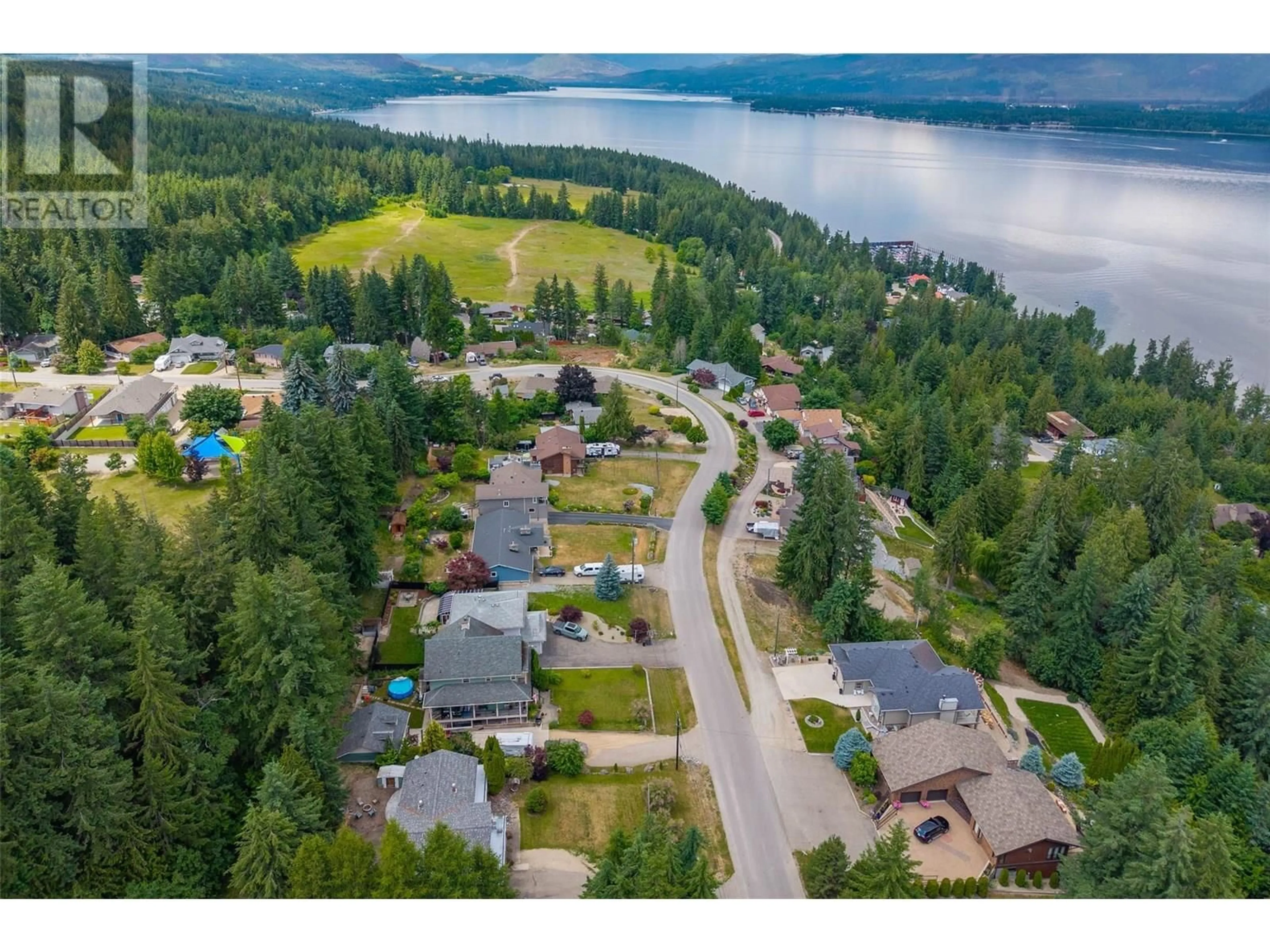 A pic from outside/outdoor area/front of a property/back of a property/a pic from drone, water/lake/river/ocean view for 2250 LAKEVIEW DRIVE, Blind Bay British Columbia V0E2W2