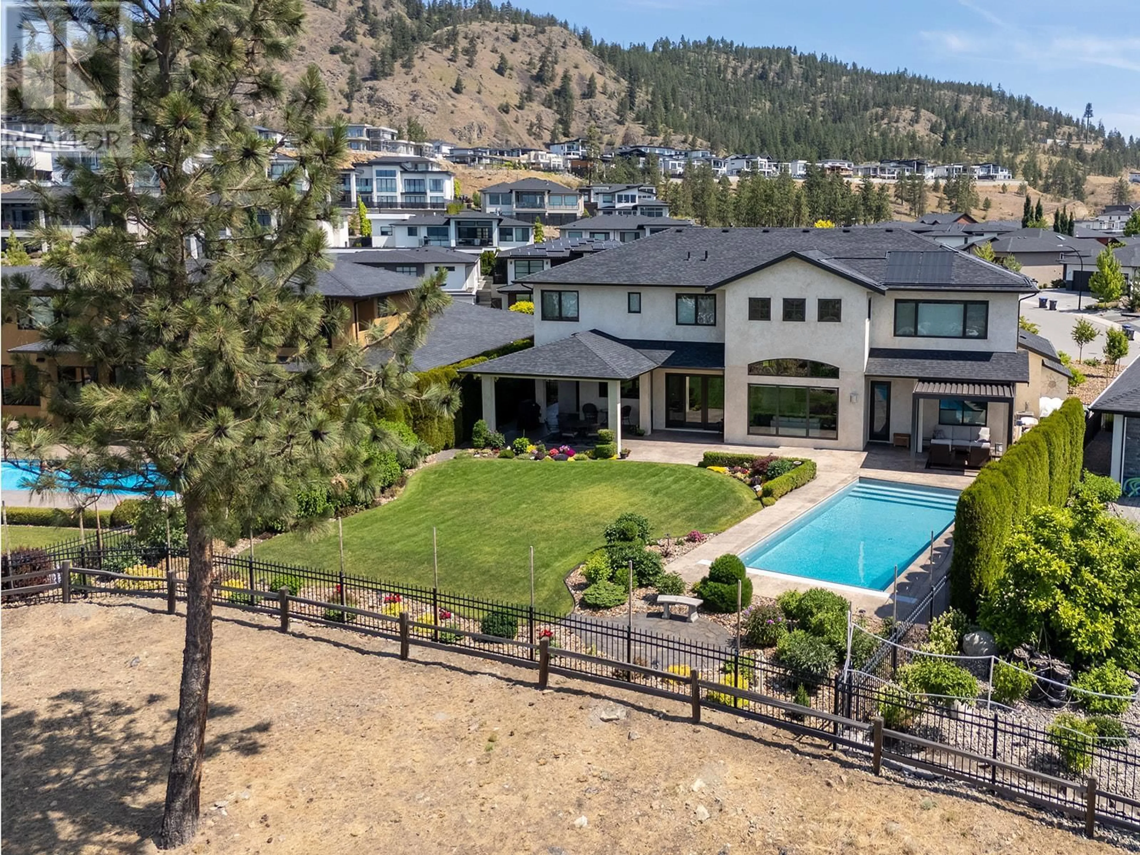 A pic from outside/outdoor area/front of a property/back of a property/a pic from drone, mountain view for 3321 VINEYARD VIEW DRIVE, West Kelowna British Columbia V4T3B4