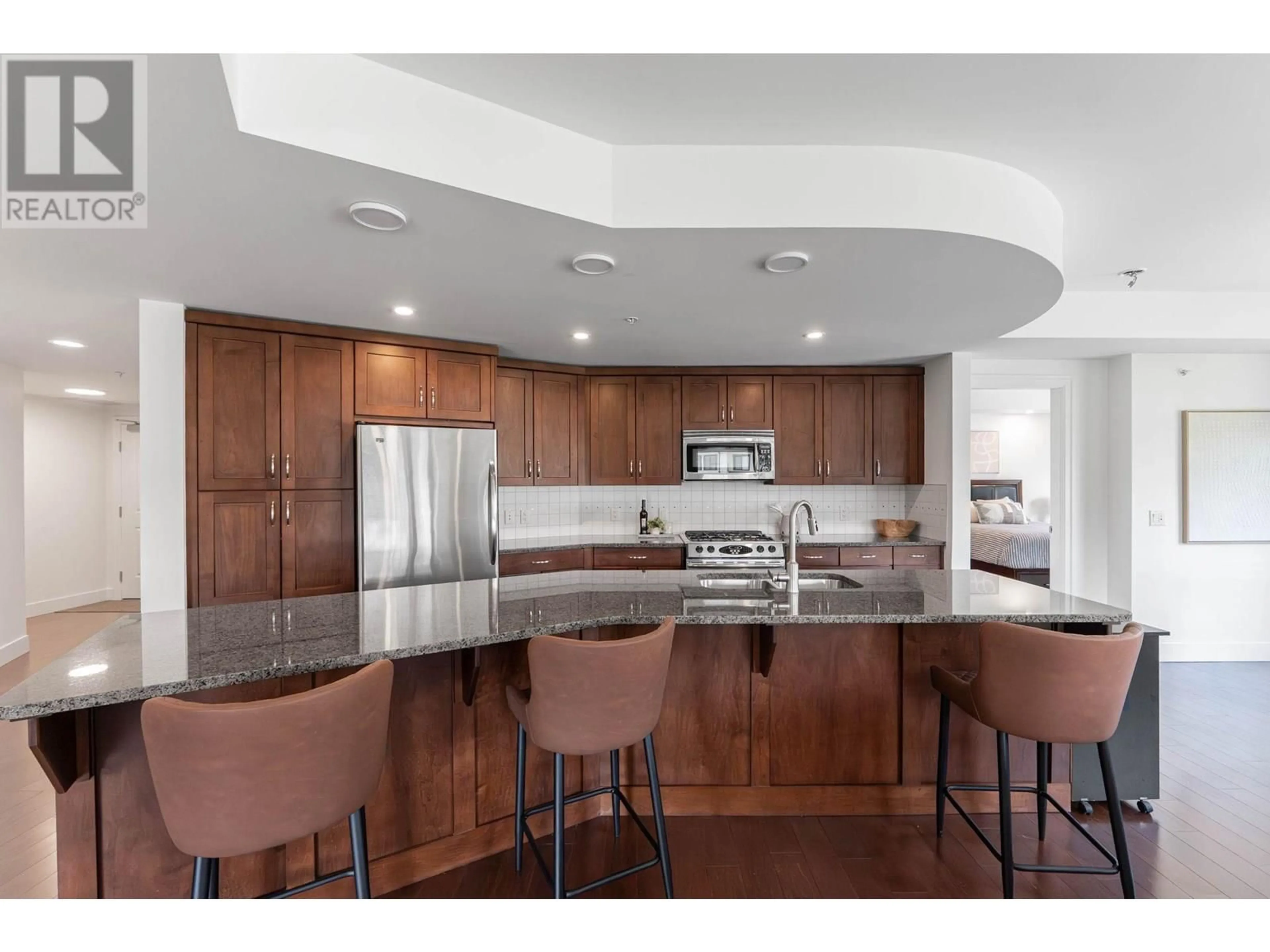 Open concept kitchen, ceramic/tile floor for 305 - 580 SARSONS ROAD, Kelowna British Columbia V1W5H5