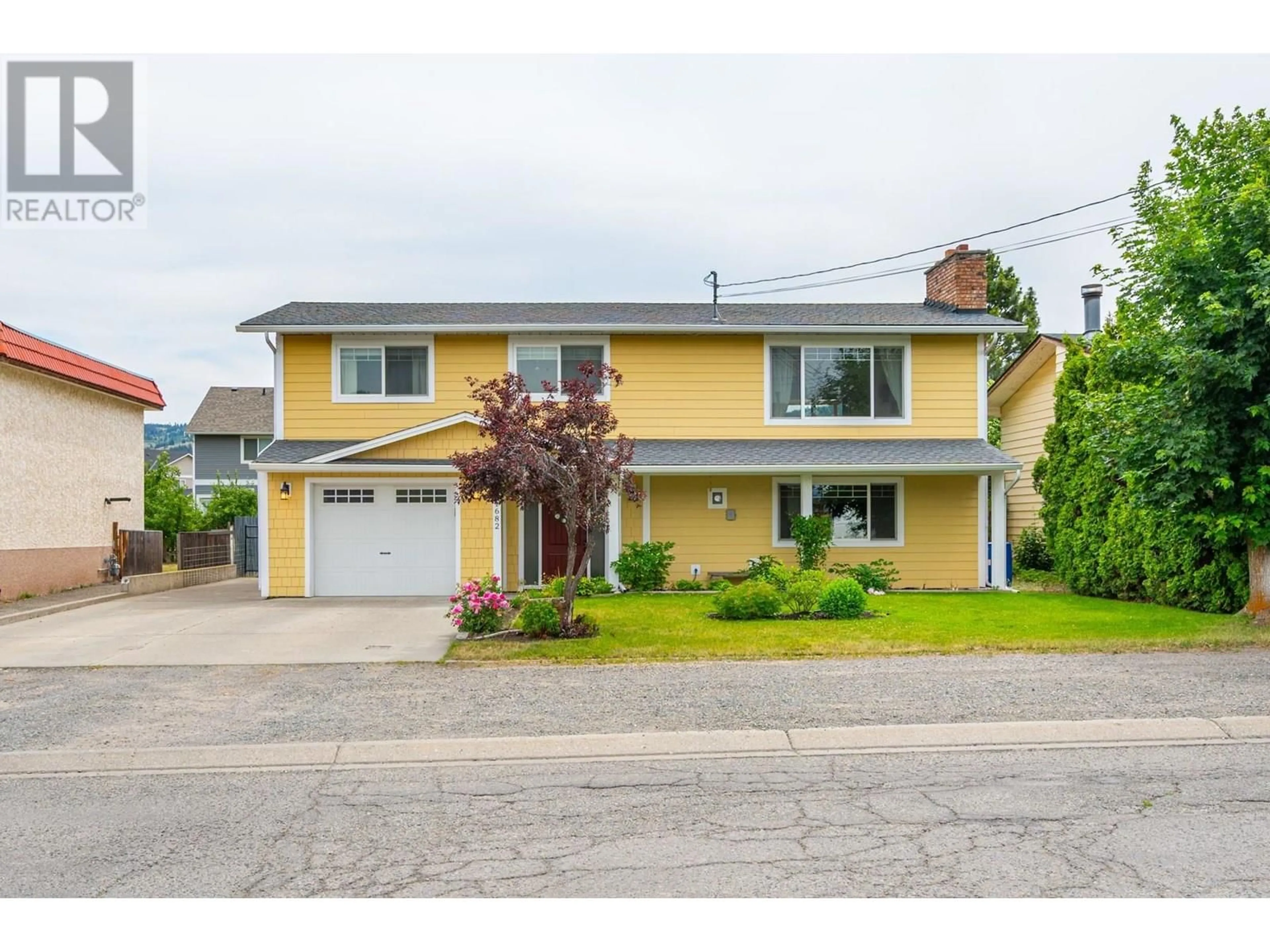 Home with vinyl exterior material, street for 1682 ARMSTRONG STREET, Merritt British Columbia V1K1E8