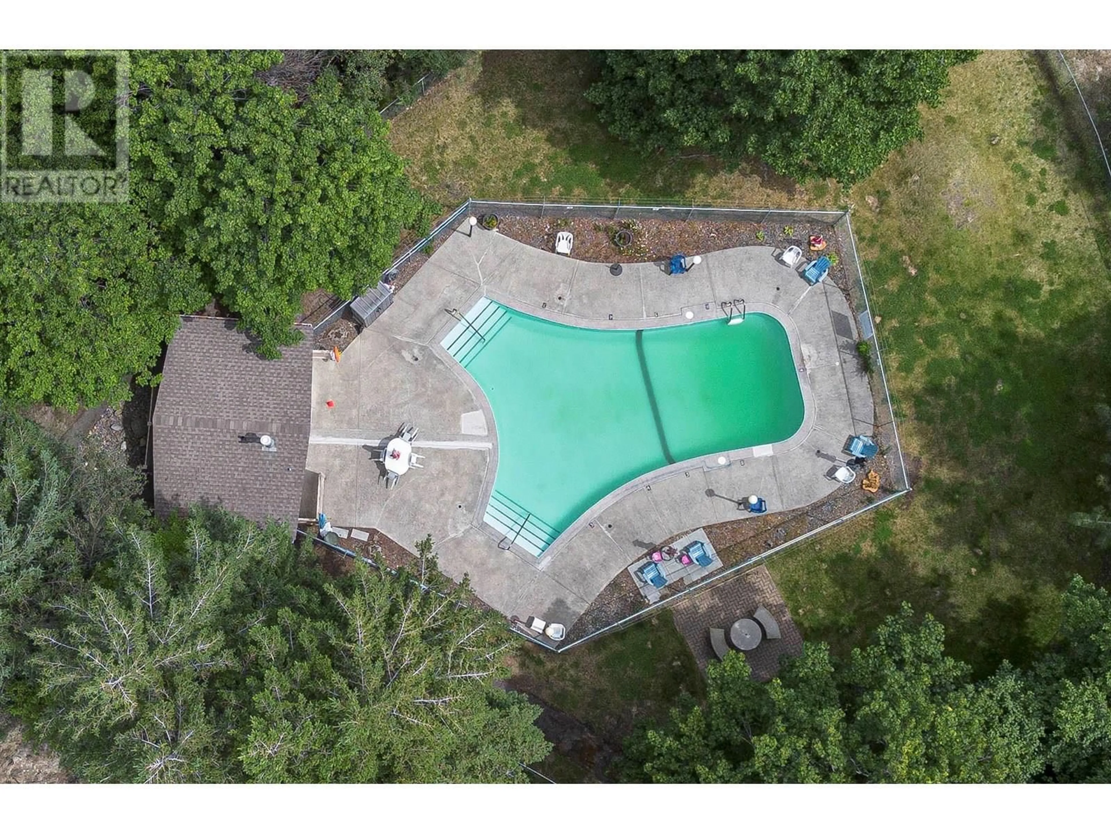 A pic from outside/outdoor area/front of a property/back of a property/a pic from drone, unknown for 4 - 1469 SPRINGHILL DRIVE, Kamloops British Columbia V2E1H5