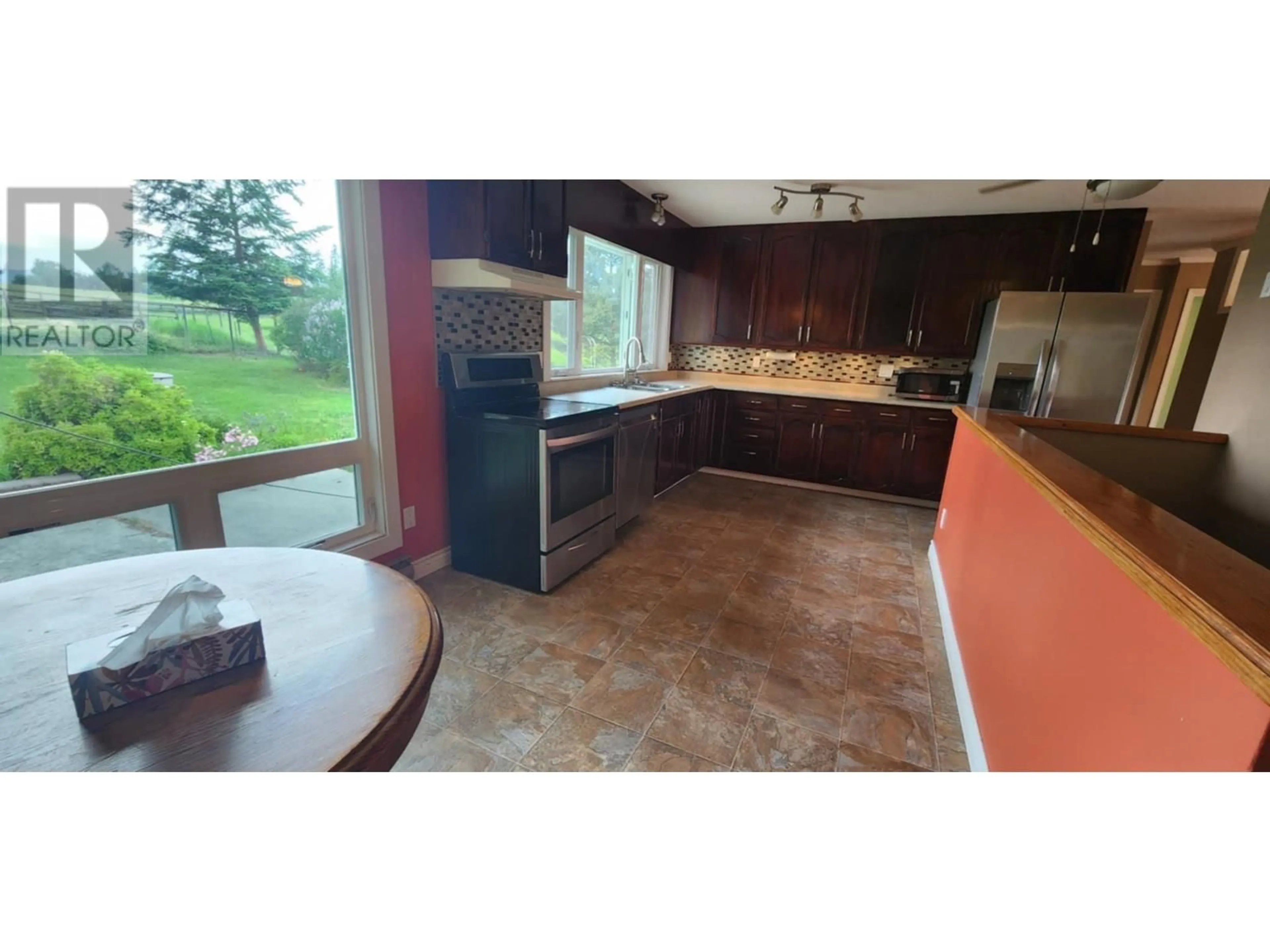 Open concept kitchen, ceramic/tile floor for 48 PUCKETT ROAD, Cherryville British Columbia V0E2G3