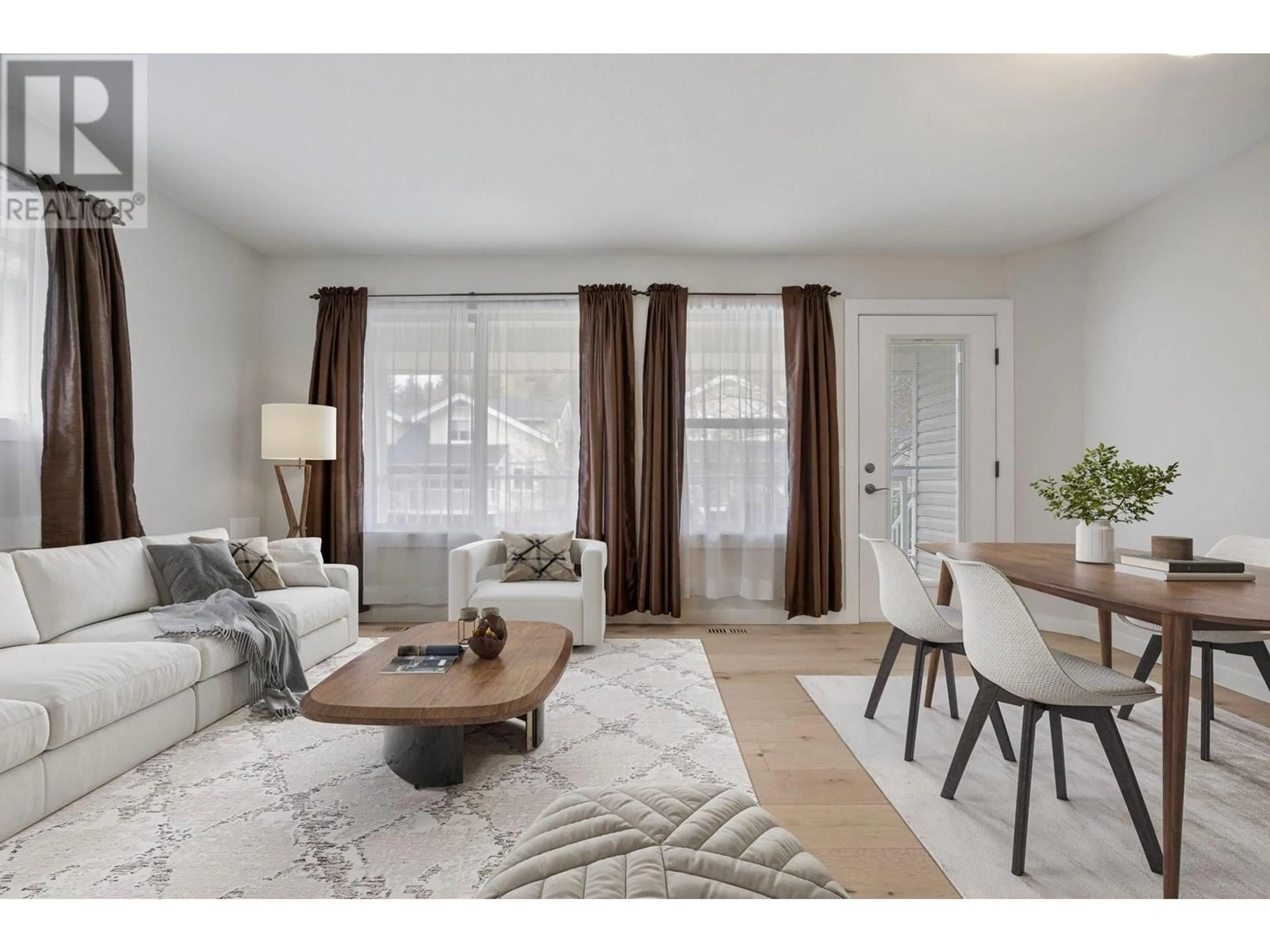 Living room with furniture, wood/laminate floor for 107 - 5460 CLEMENTS CRESCENT, Peachland British Columbia V0H1X5