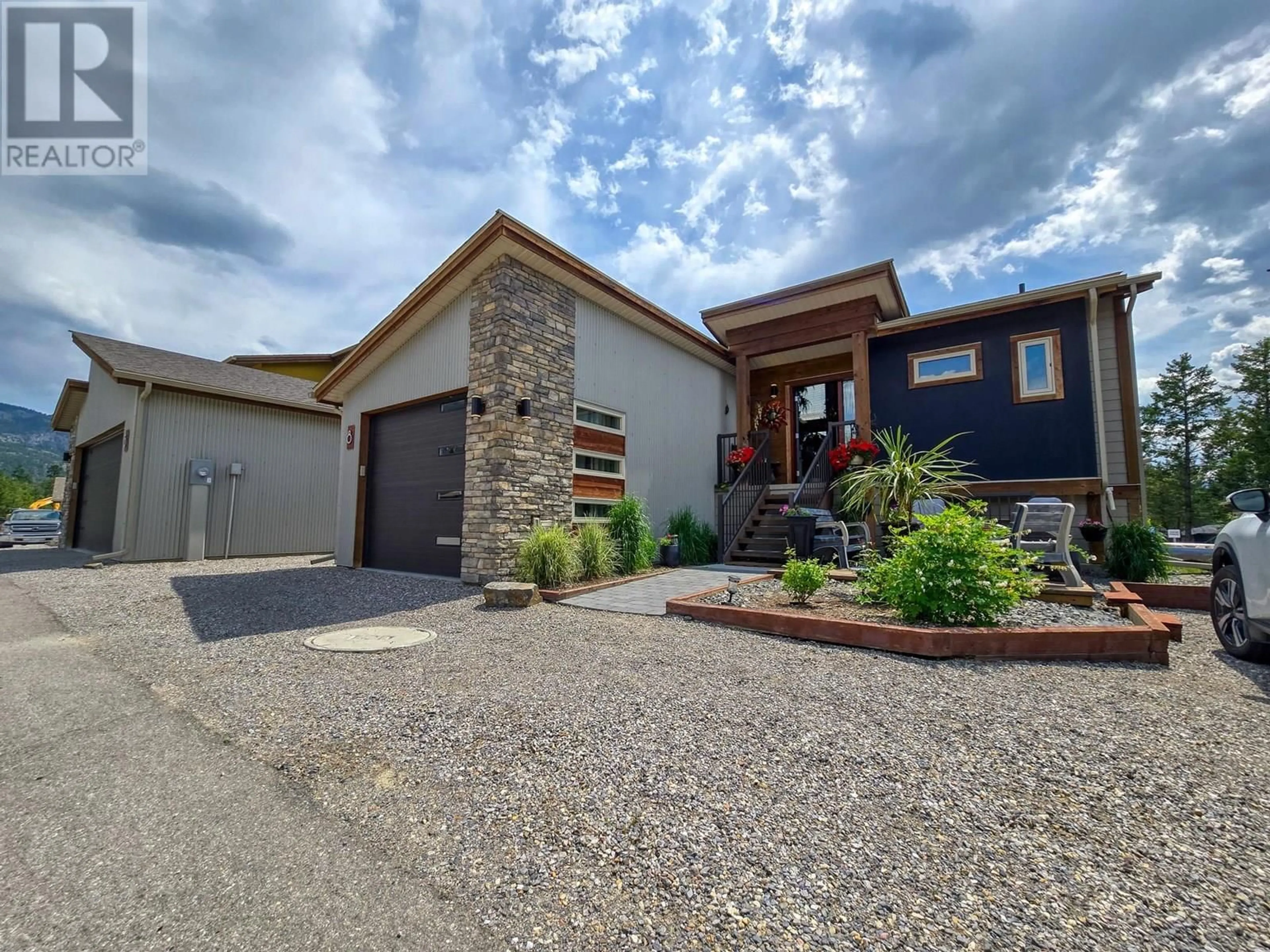 A pic from outside/outdoor area/front of a property/back of a property/a pic from drone, street for 8 - 4926 TIMBER RIDGE ROAD, Windermere British Columbia V0A1K3