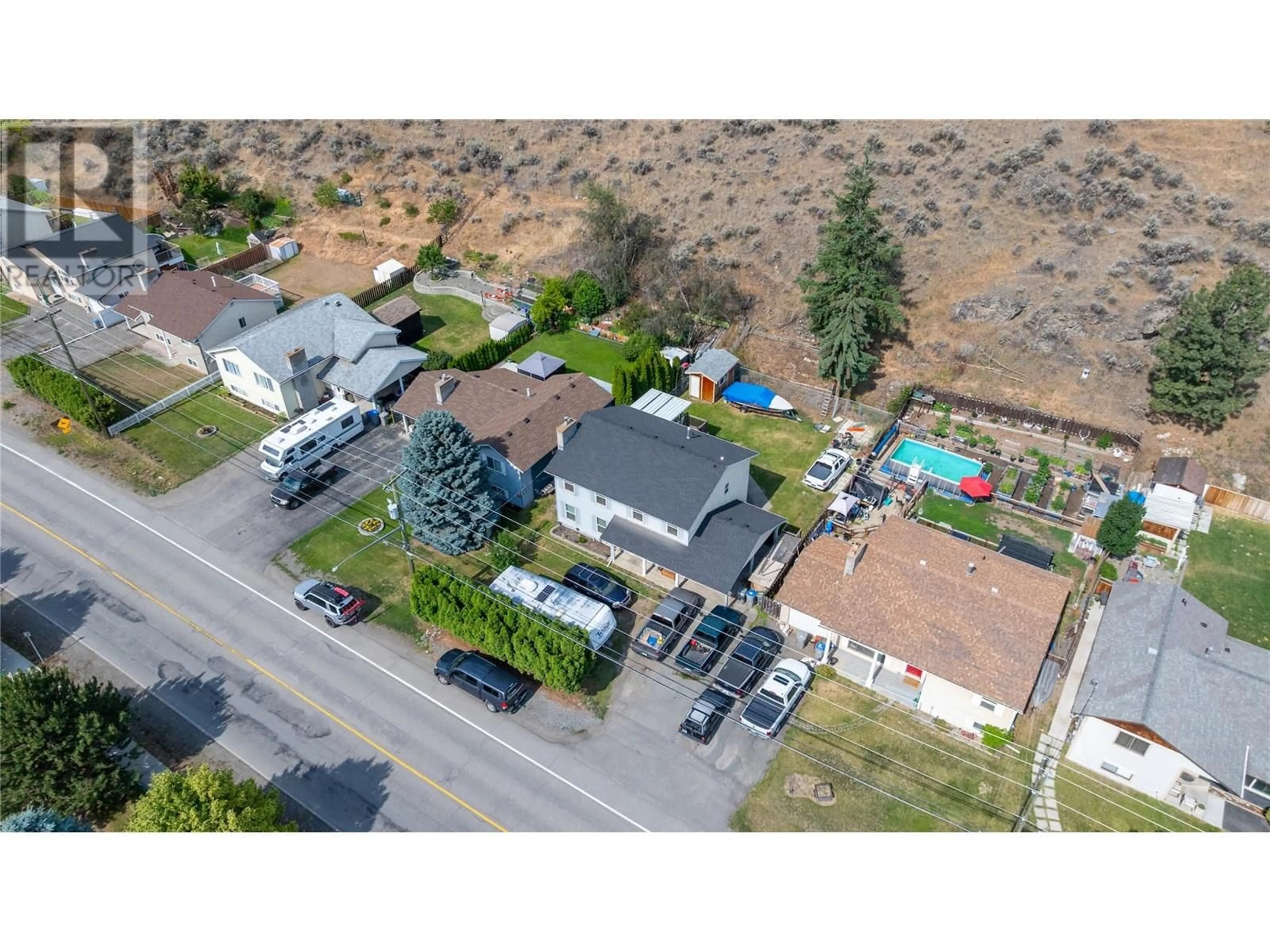 A pic from outside/outdoor area/front of a property/back of a property/a pic from drone, street for 3688 WESTSYDE ROAD, Kamloops British Columbia V2B7H6