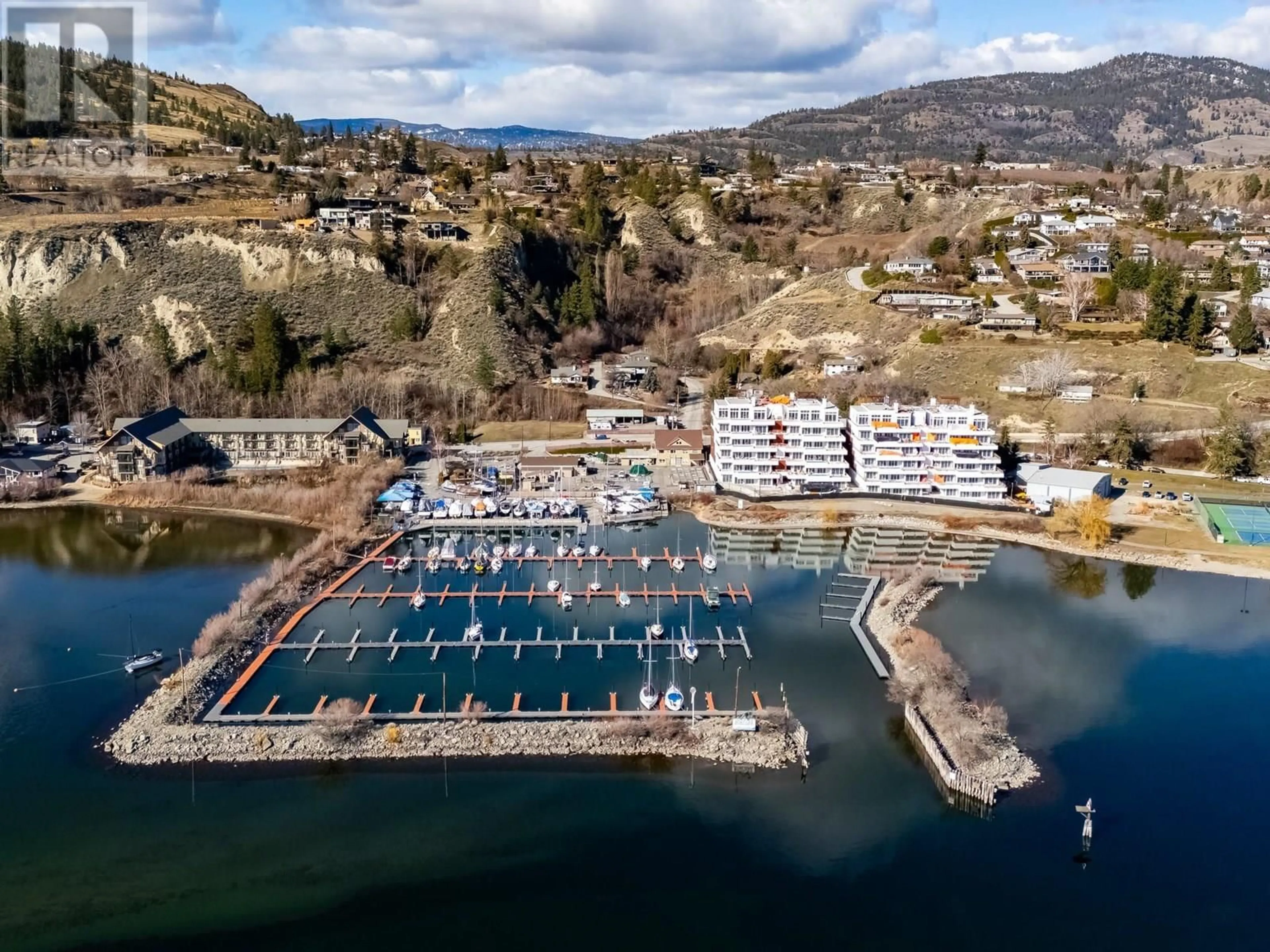A pic from outside/outdoor area/front of a property/back of a property/a pic from drone, water/lake/river/ocean view for 102 - 13419 LAKESHORE DRIVE SOUTH, Summerland British Columbia V0H1Z1