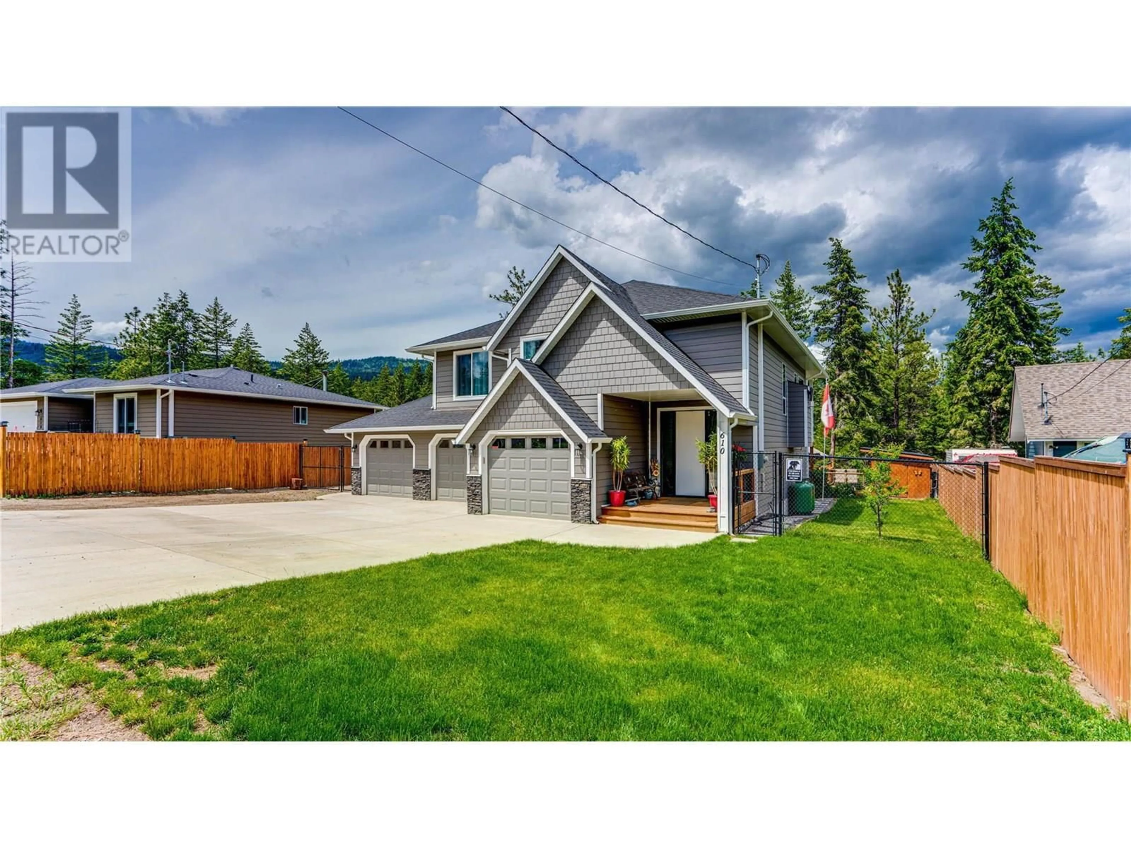 Home with vinyl exterior material, street for 610 MUIR ROAD, Kelowna British Columbia V1Z3W1
