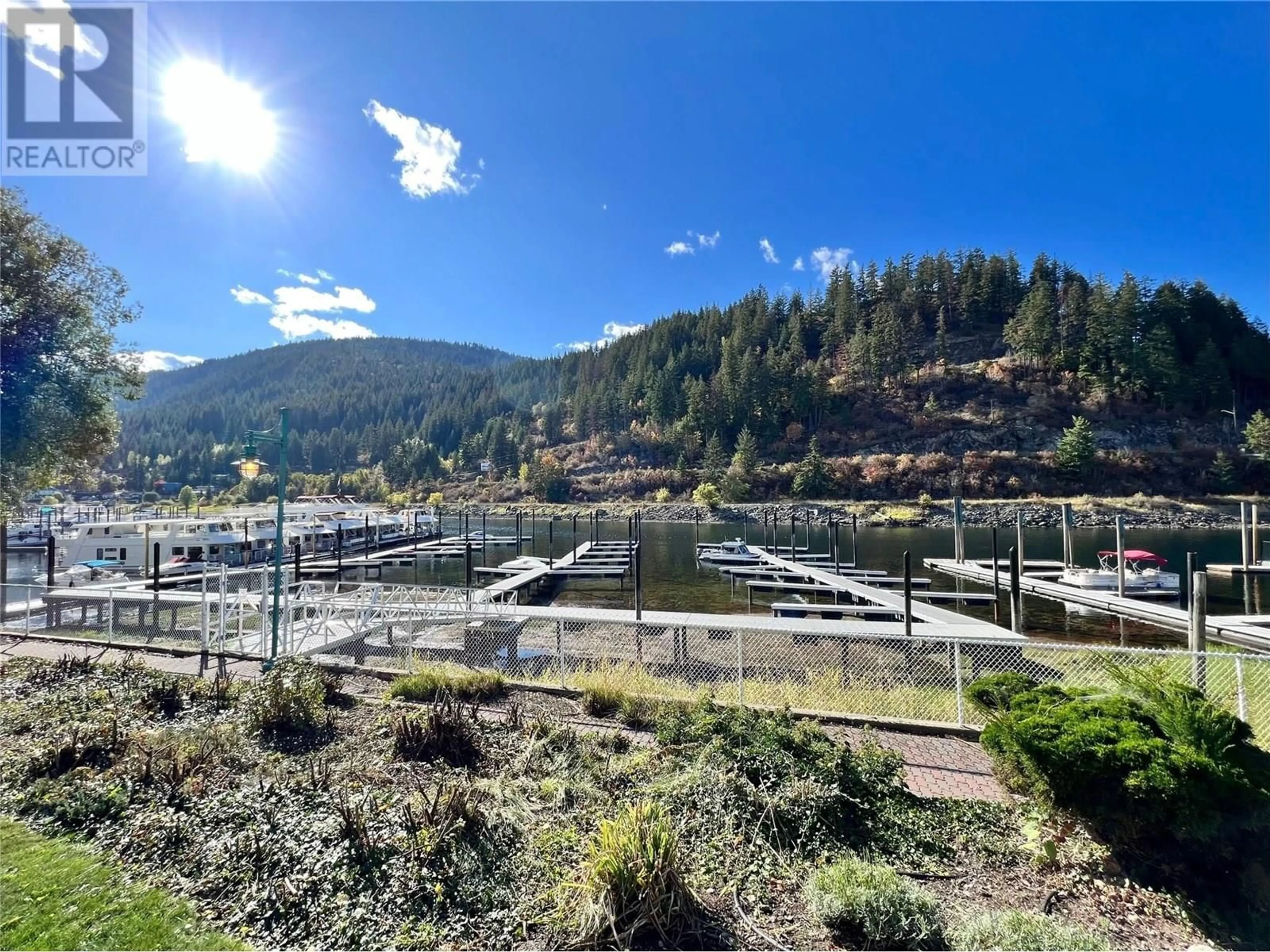 A pic from outside/outdoor area/front of a property/back of a property/a pic from drone, mountain view for B304 - 1118 RIVERSIDE AVENUE, Sicamous British Columbia V0E2V1
