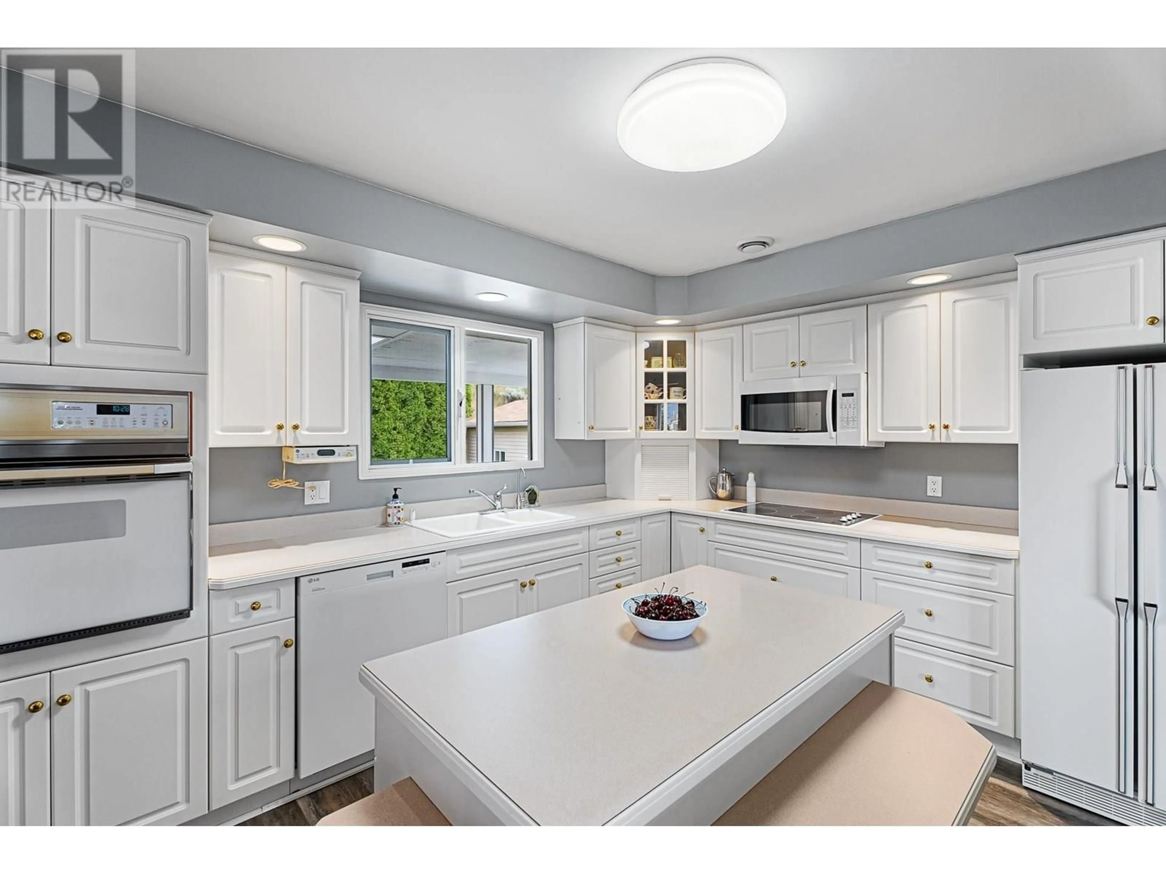Open concept kitchen, ceramic/tile floor for 2819 CRANNA CRESCENT, Merritt British Columbia V1K1E6