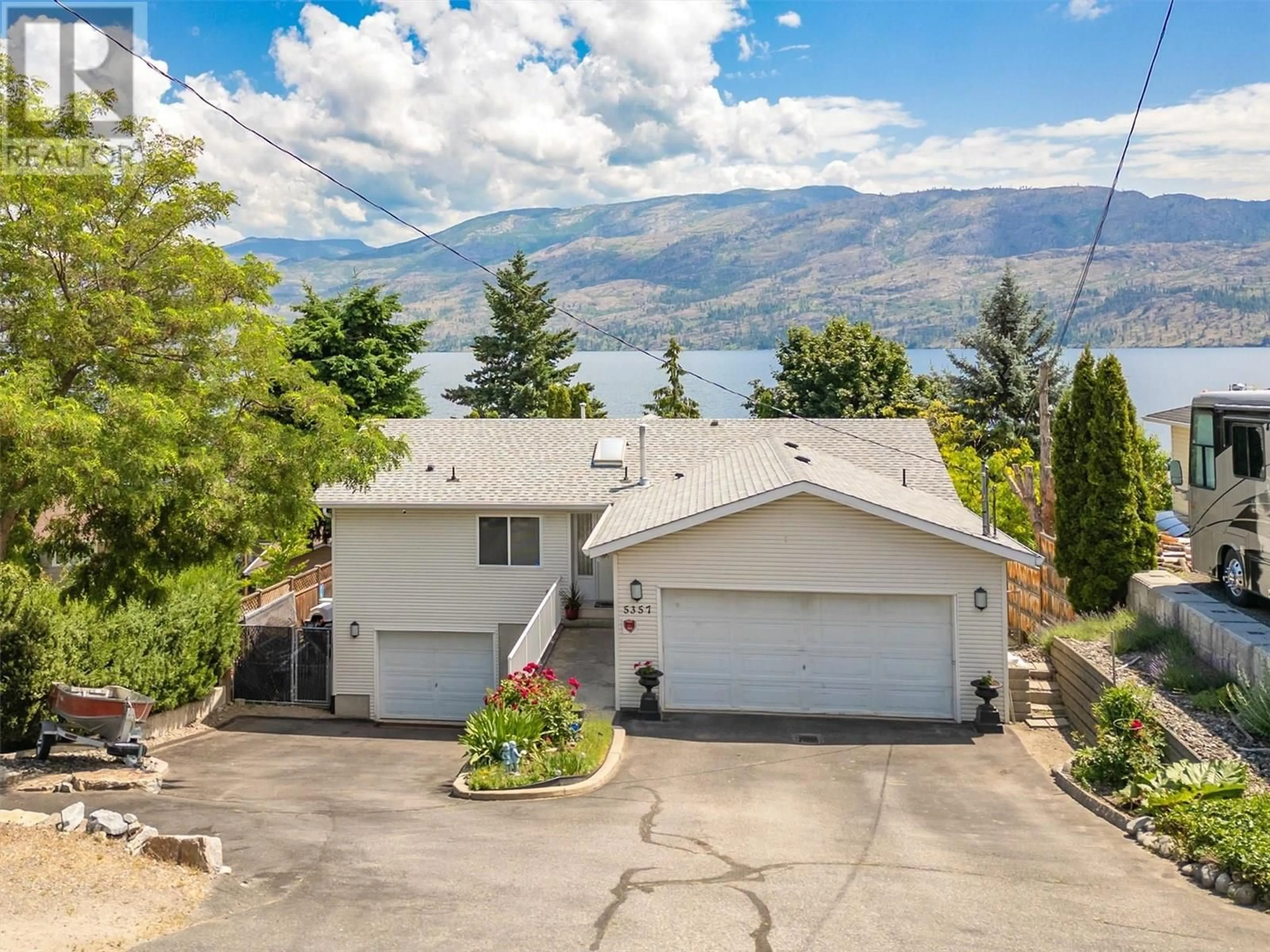 A pic from outside/outdoor area/front of a property/back of a property/a pic from drone, mountain view for 5357 BUCHANAN ROAD, Peachland British Columbia V0H1X1