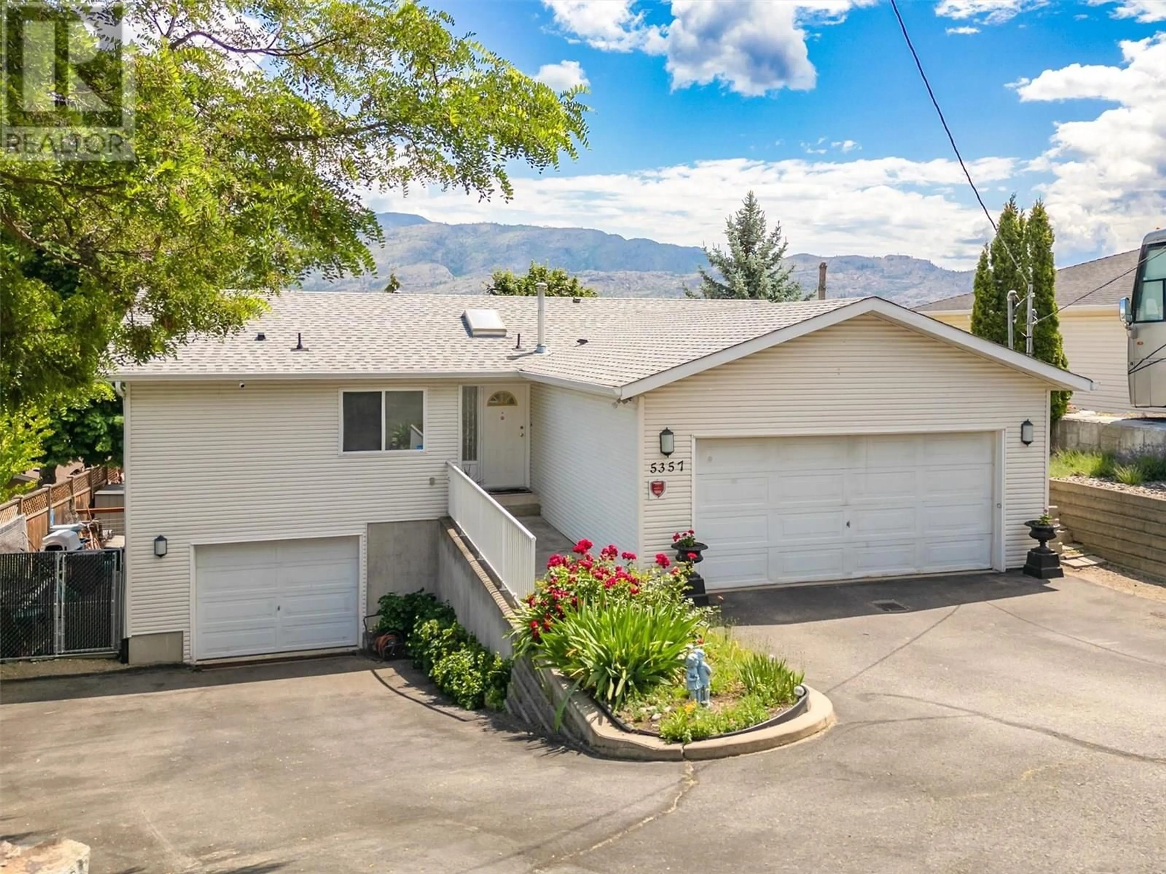 A pic from outside/outdoor area/front of a property/back of a property/a pic from drone, street for 5357 BUCHANAN ROAD, Peachland British Columbia V0H1X1