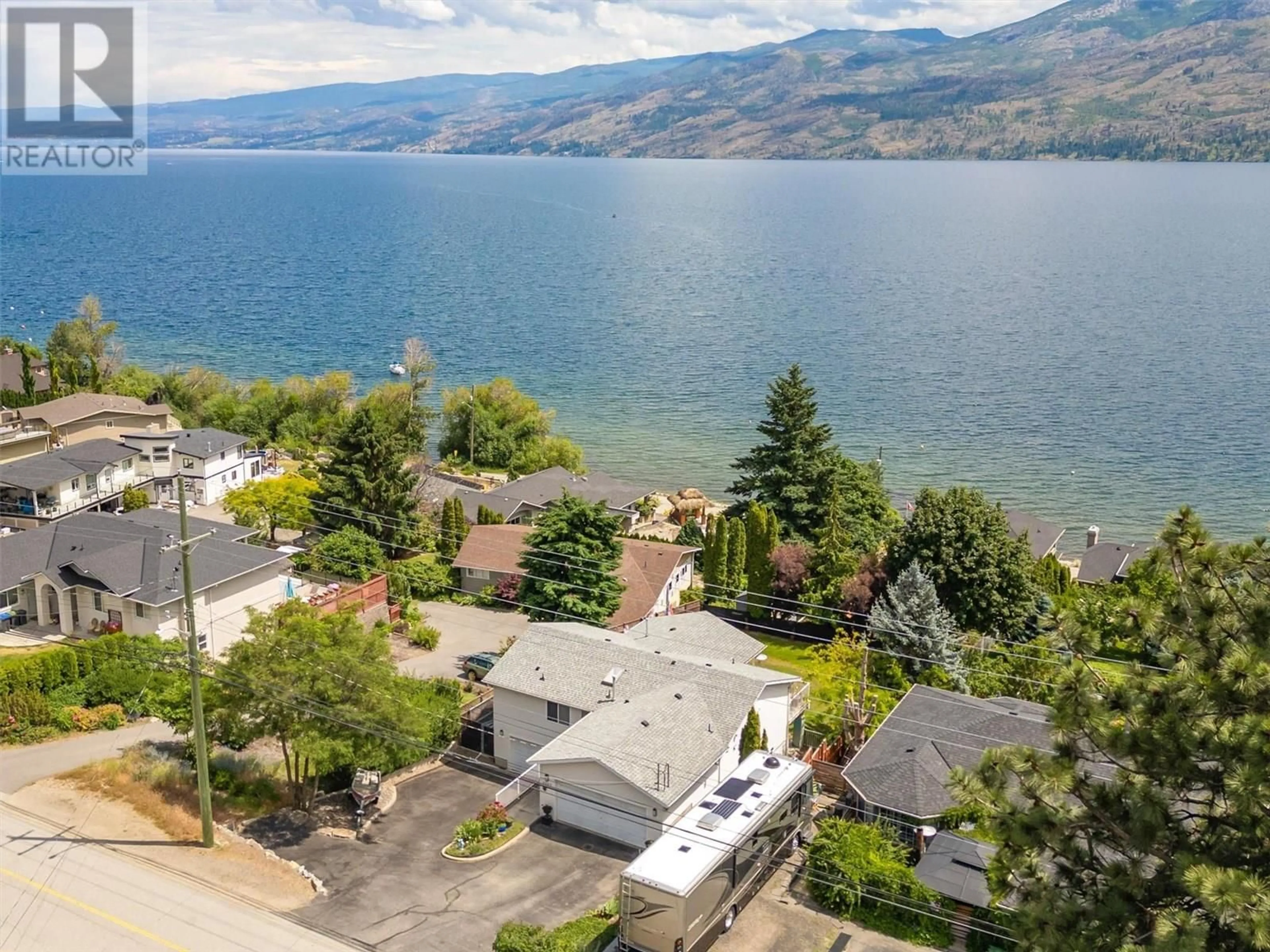 A pic from outside/outdoor area/front of a property/back of a property/a pic from drone, water/lake/river/ocean view for 5357 BUCHANAN ROAD, Peachland British Columbia V0H1X1