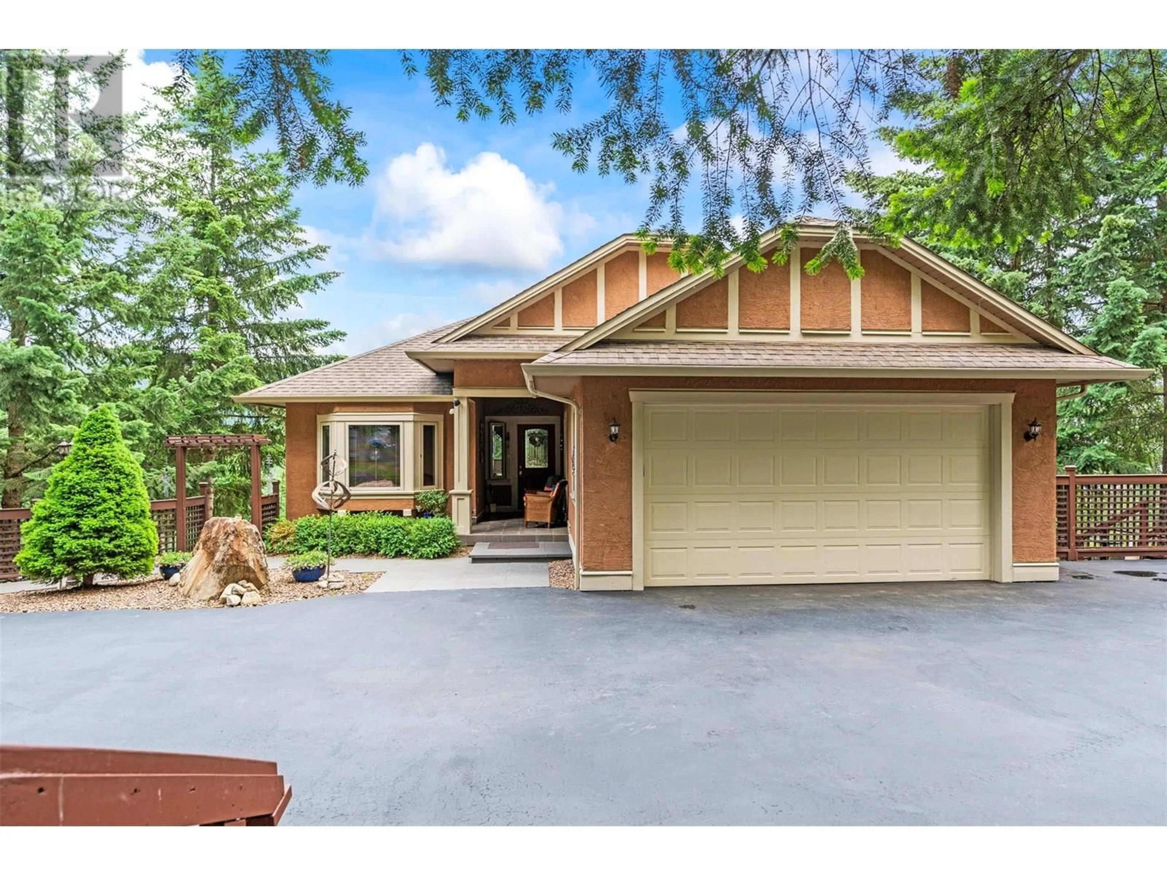 Home with vinyl exterior material, street for 8215 SILVER STAR ROAD, Vernon British Columbia V1B3M8