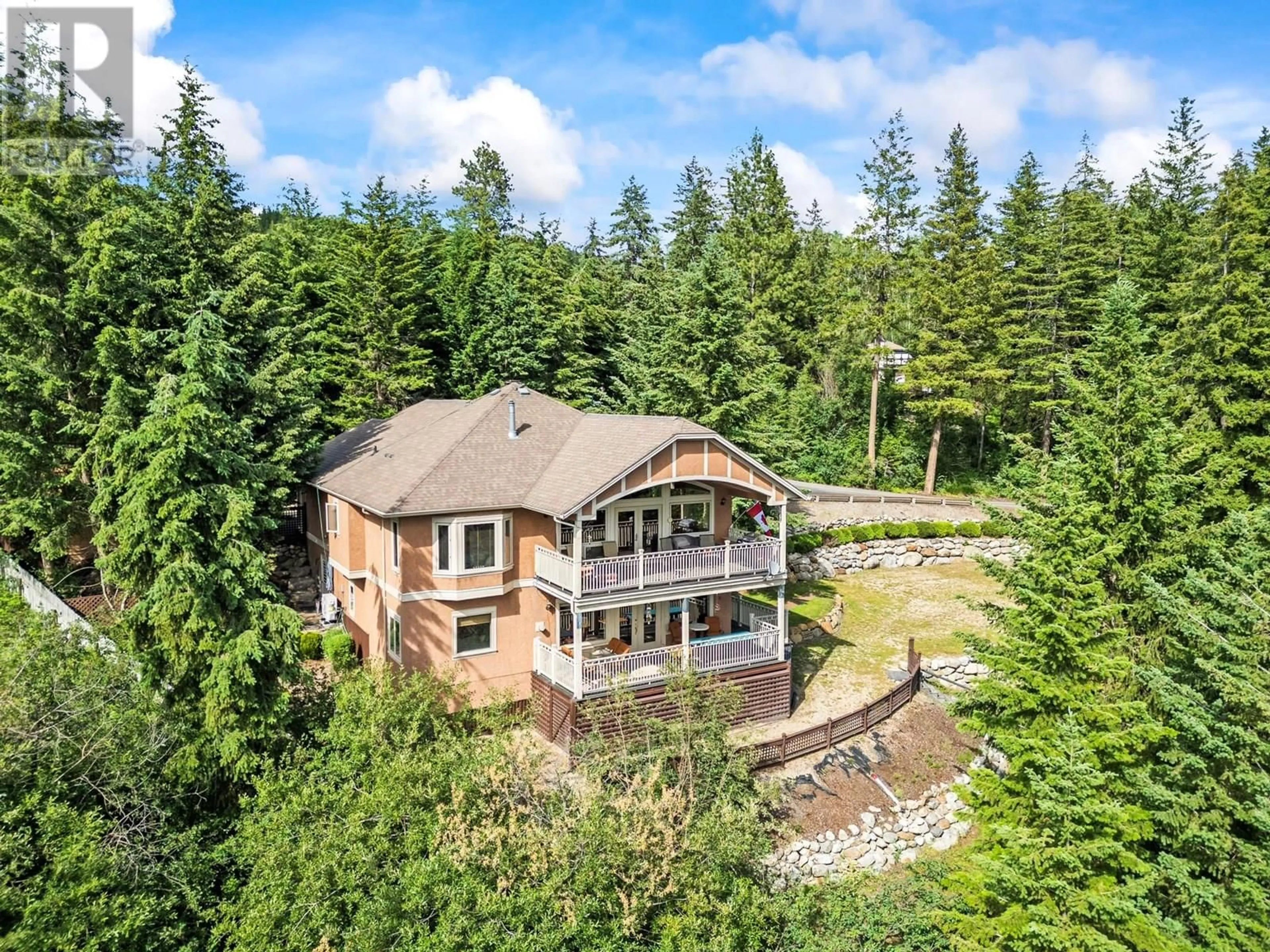 A pic from outside/outdoor area/front of a property/back of a property/a pic from drone, unknown for 8215 SILVER STAR ROAD, Vernon British Columbia V1B3M8
