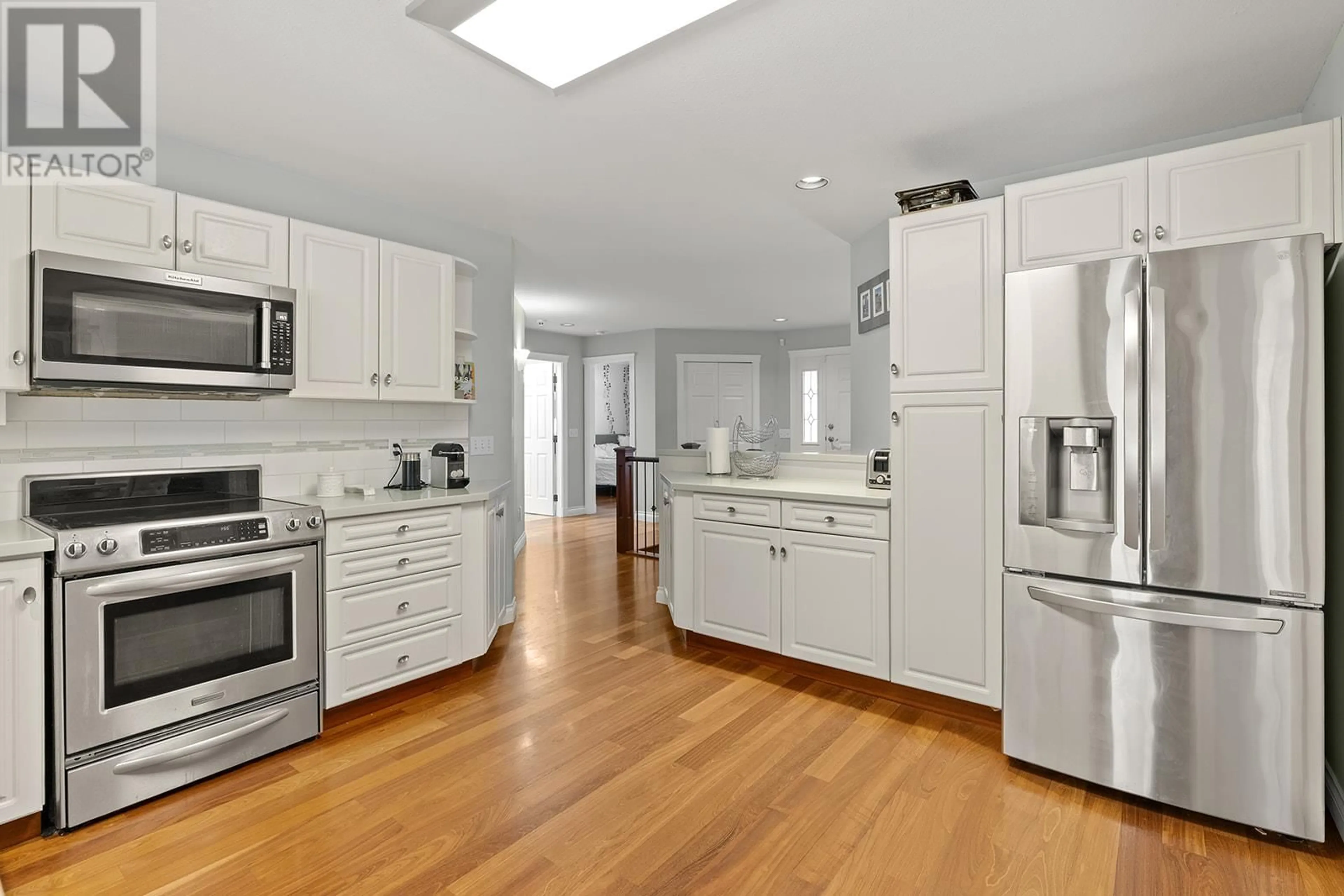 Open concept kitchen, unknown for 442 CURLEW DRIVE, Kelowna British Columbia V1W4L2