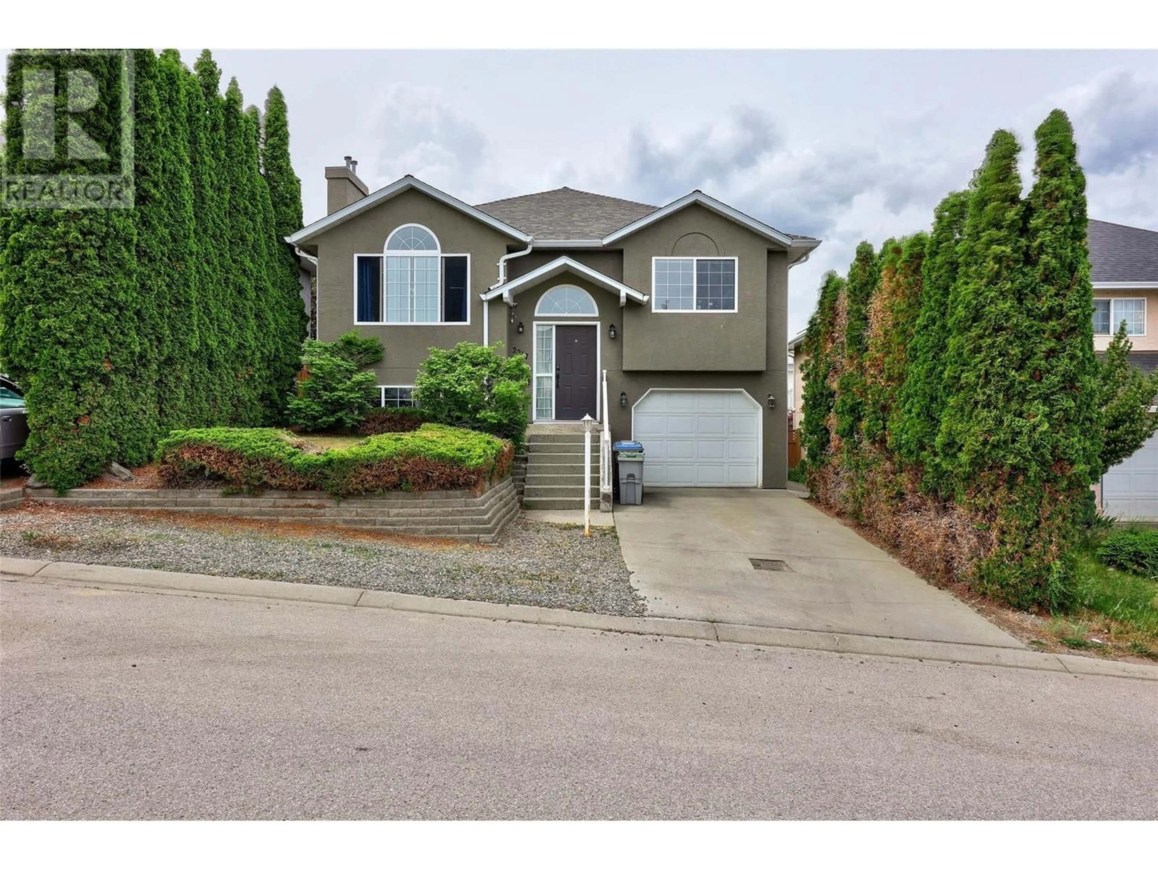 Home with vinyl exterior material, street for 2217 TURNBERRY PLACE, Kamloops British Columbia V1S1S7
