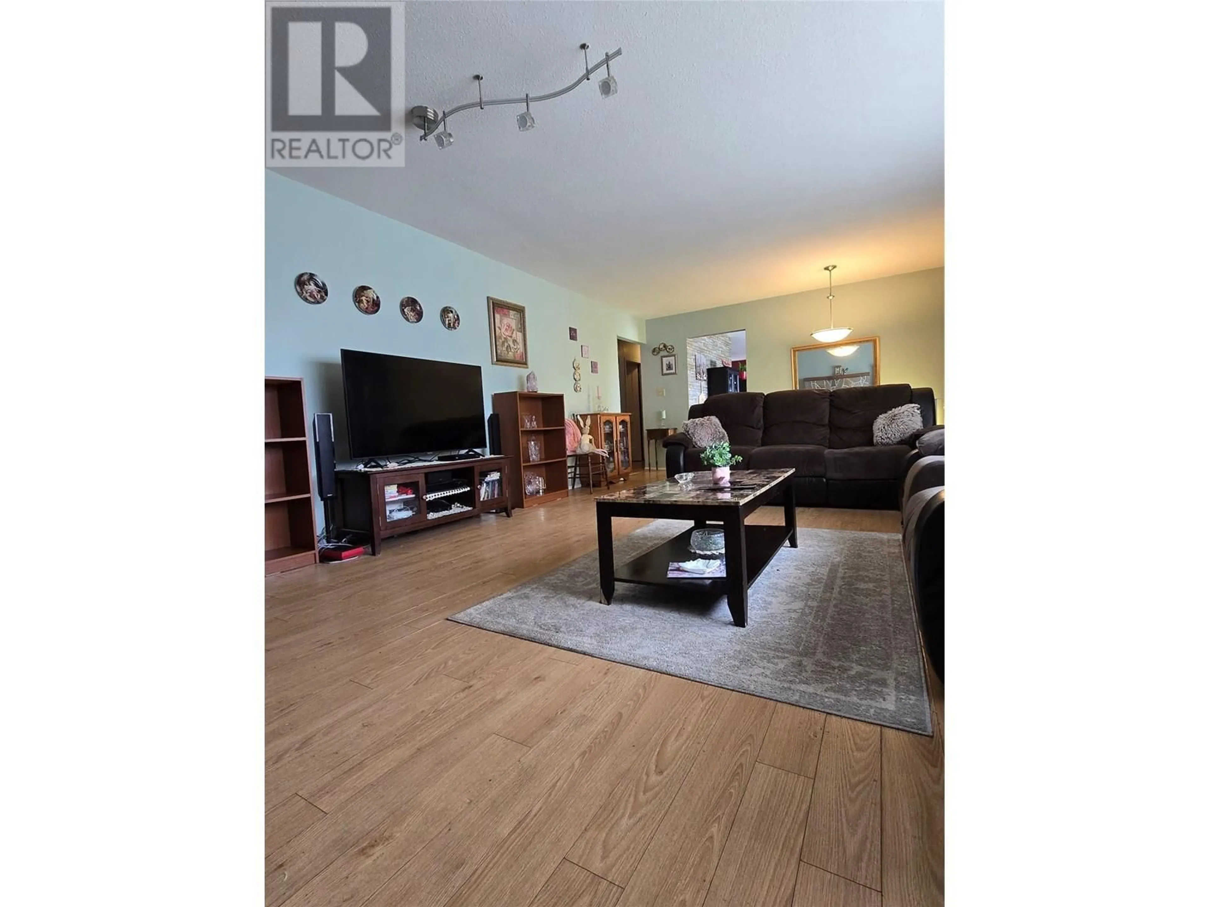 Living room with furniture, wood/laminate floor for 2030 AUTO ROAD SOUTHEAST, Salmon Arm British Columbia V1E2J7