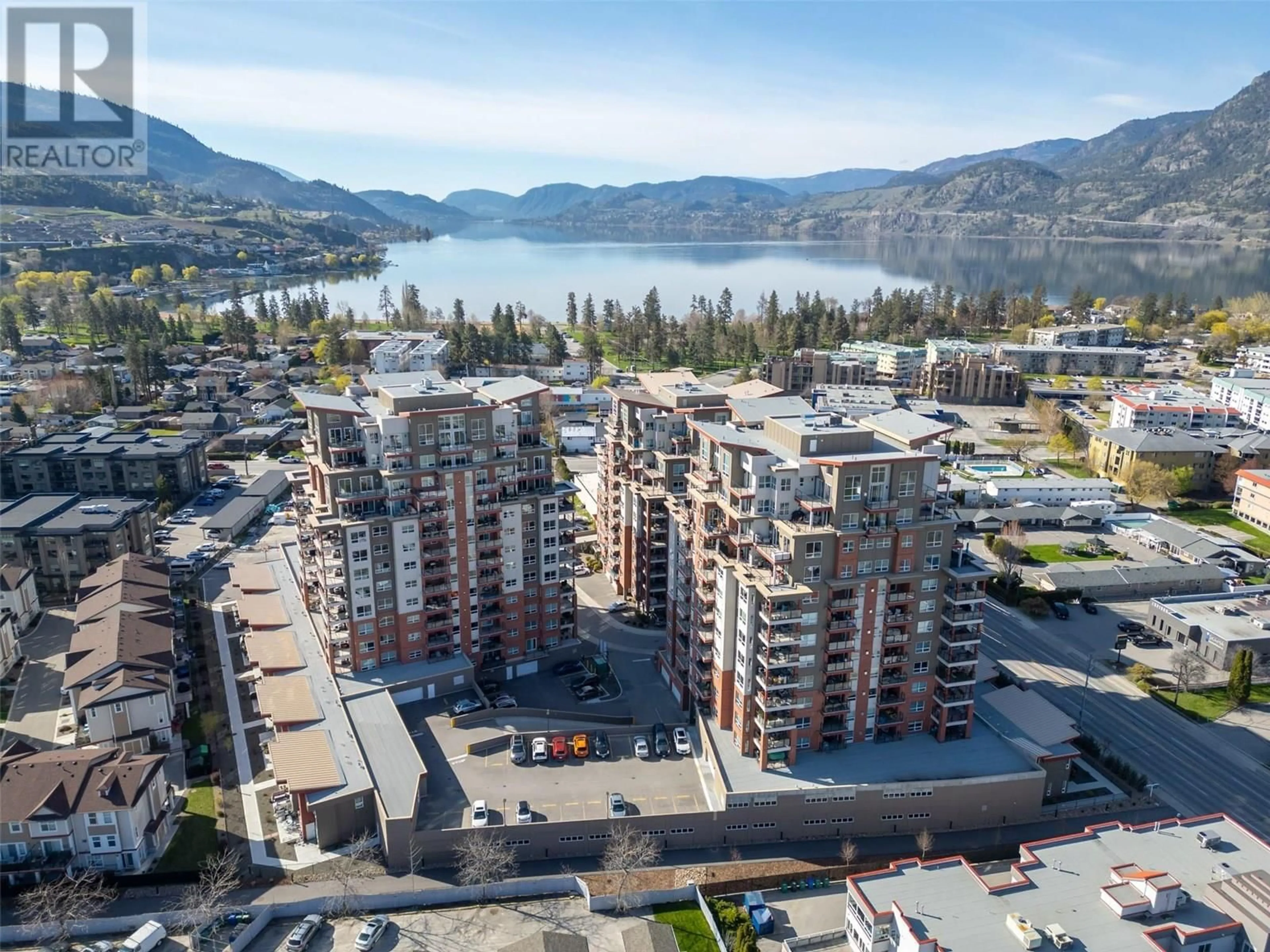 A pic from outside/outdoor area/front of a property/back of a property/a pic from drone, water/lake/river/ocean view for 306 - 3346 SKAHA LAKE ROAD, Penticton British Columbia V2A0H6