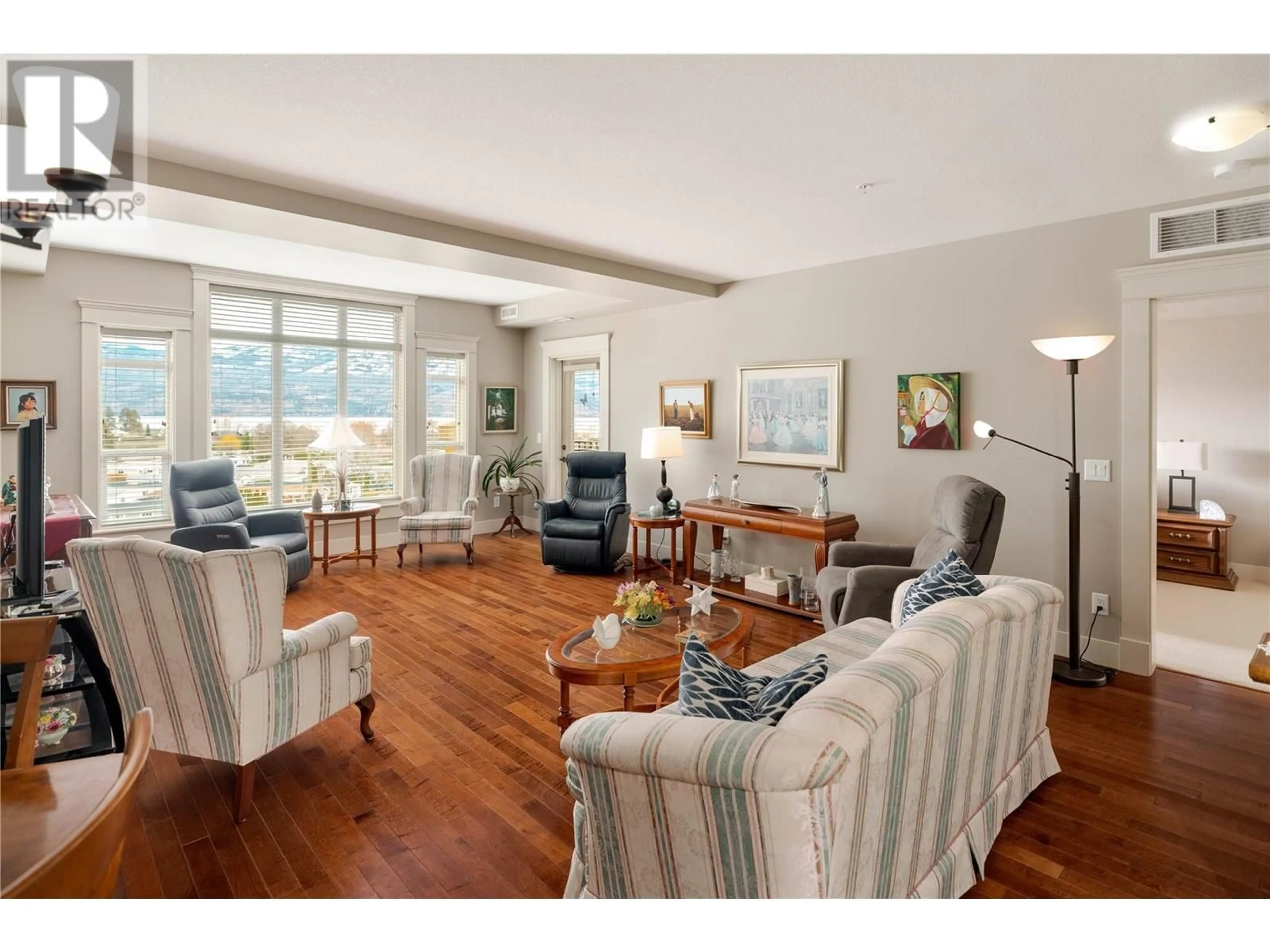 Living room with furniture, wood/laminate floor for 519 - 2070 BOUCHERIE ROAD, West Kelowna British Columbia V4T3K9