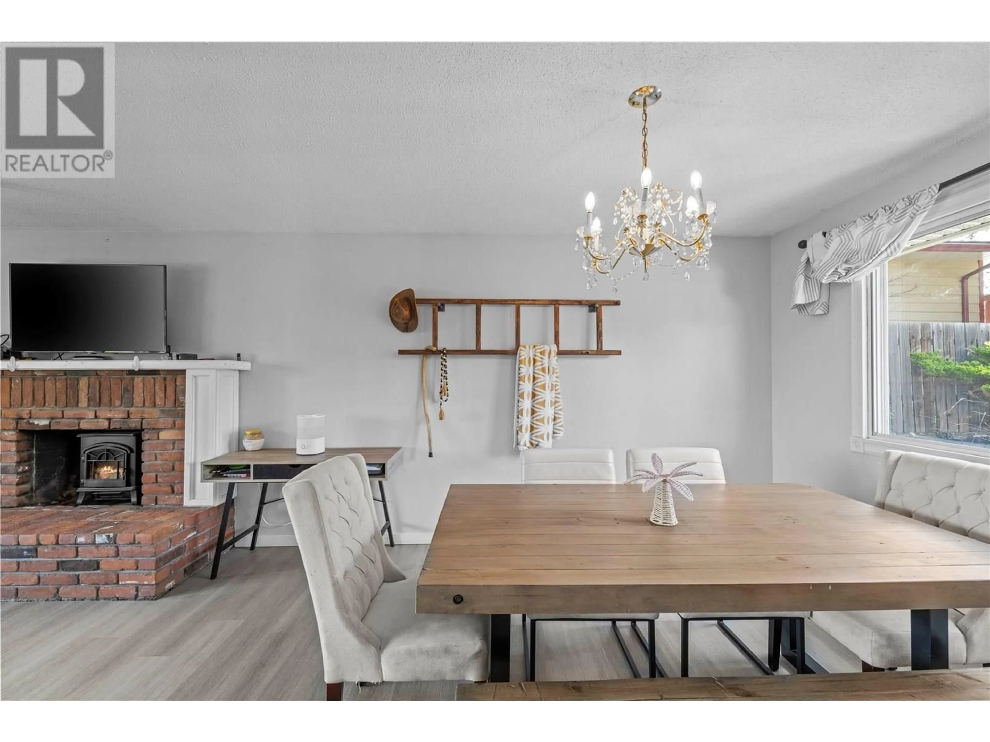 Dining room, wood/laminate floor for 787 GLENEAGLES DRIVE, Kamloops British Columbia V2E1J7