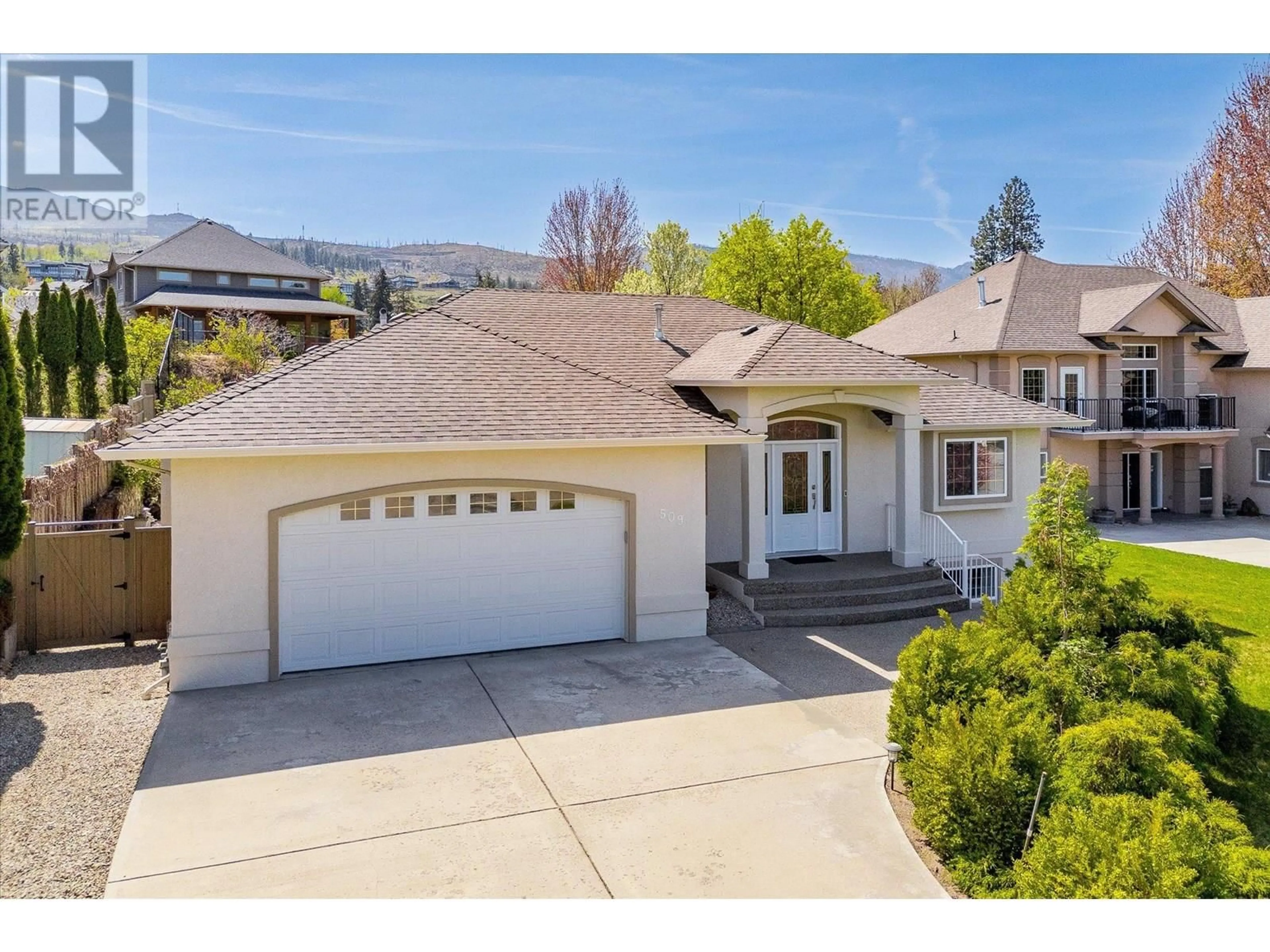 A pic from outside/outdoor area/front of a property/back of a property/a pic from drone, street for 509 CURLEW DRIVE, Kelowna British Columbia V1W4K9