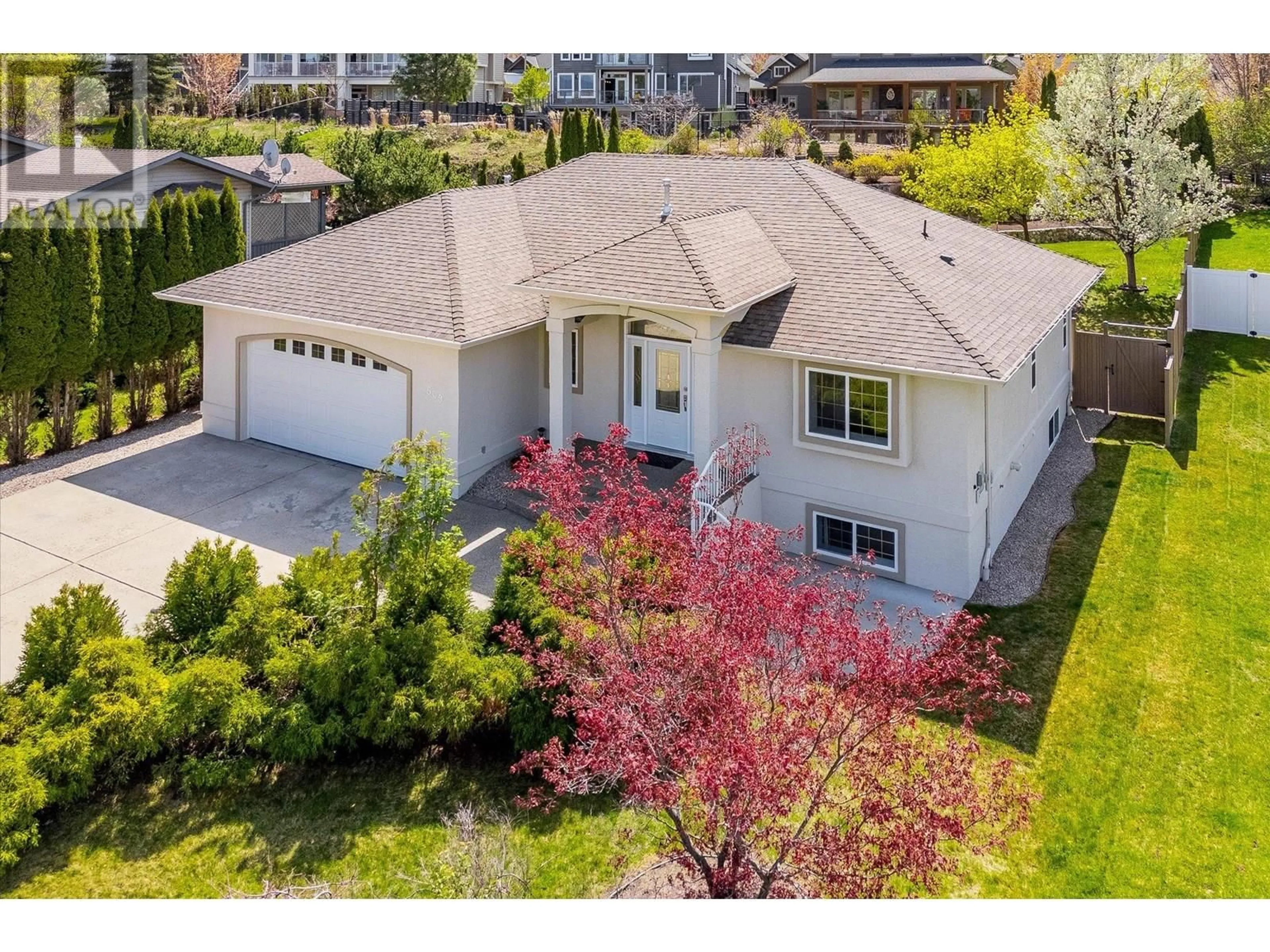 A pic from outside/outdoor area/front of a property/back of a property/a pic from drone, street for 509 CURLEW DRIVE, Kelowna British Columbia V1W4K9