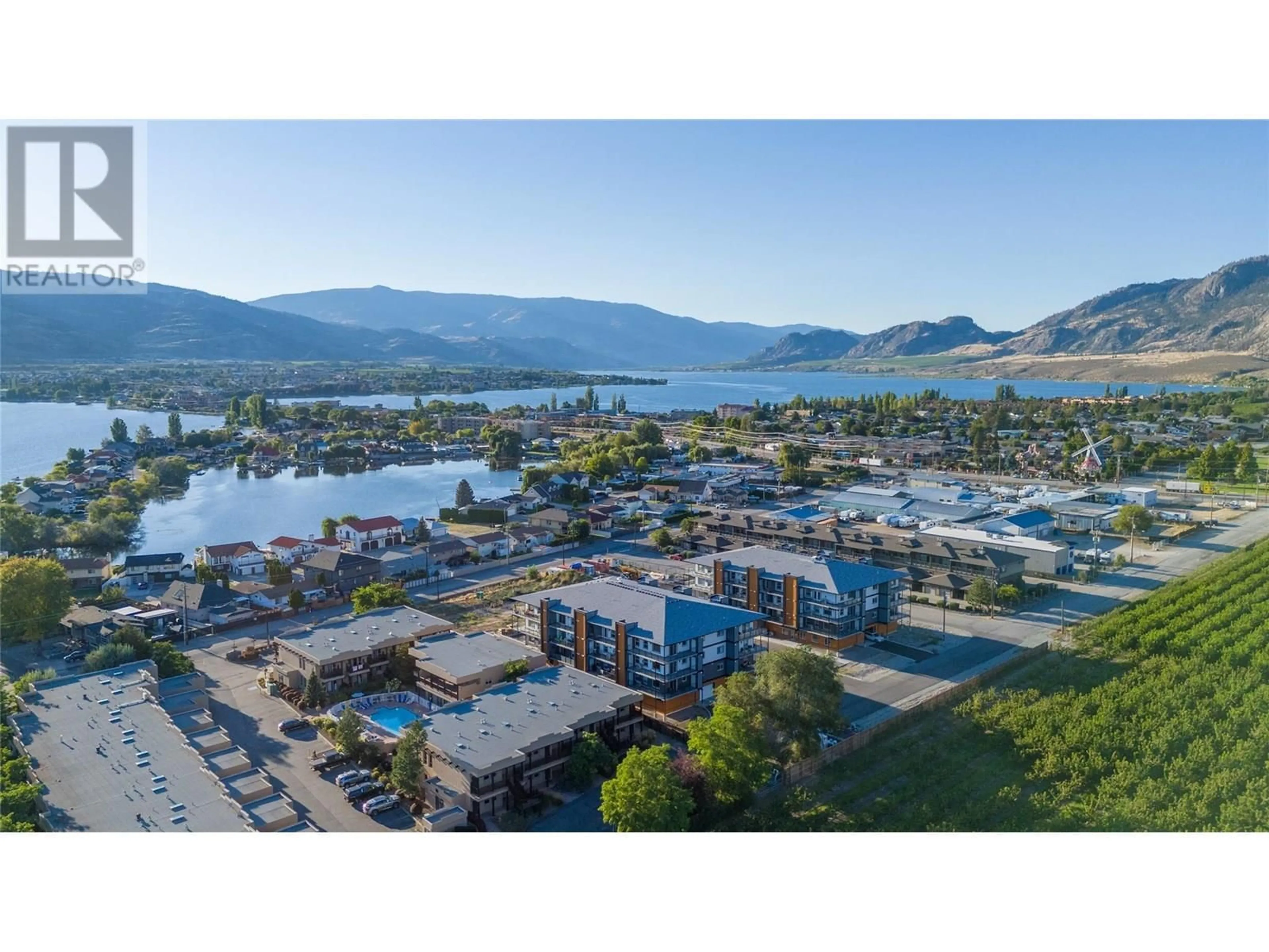A pic from outside/outdoor area/front of a property/back of a property/a pic from drone, water/lake/river/ocean view for 307 - 5620 51ST STREET, Osoyoos British Columbia V0H1V6