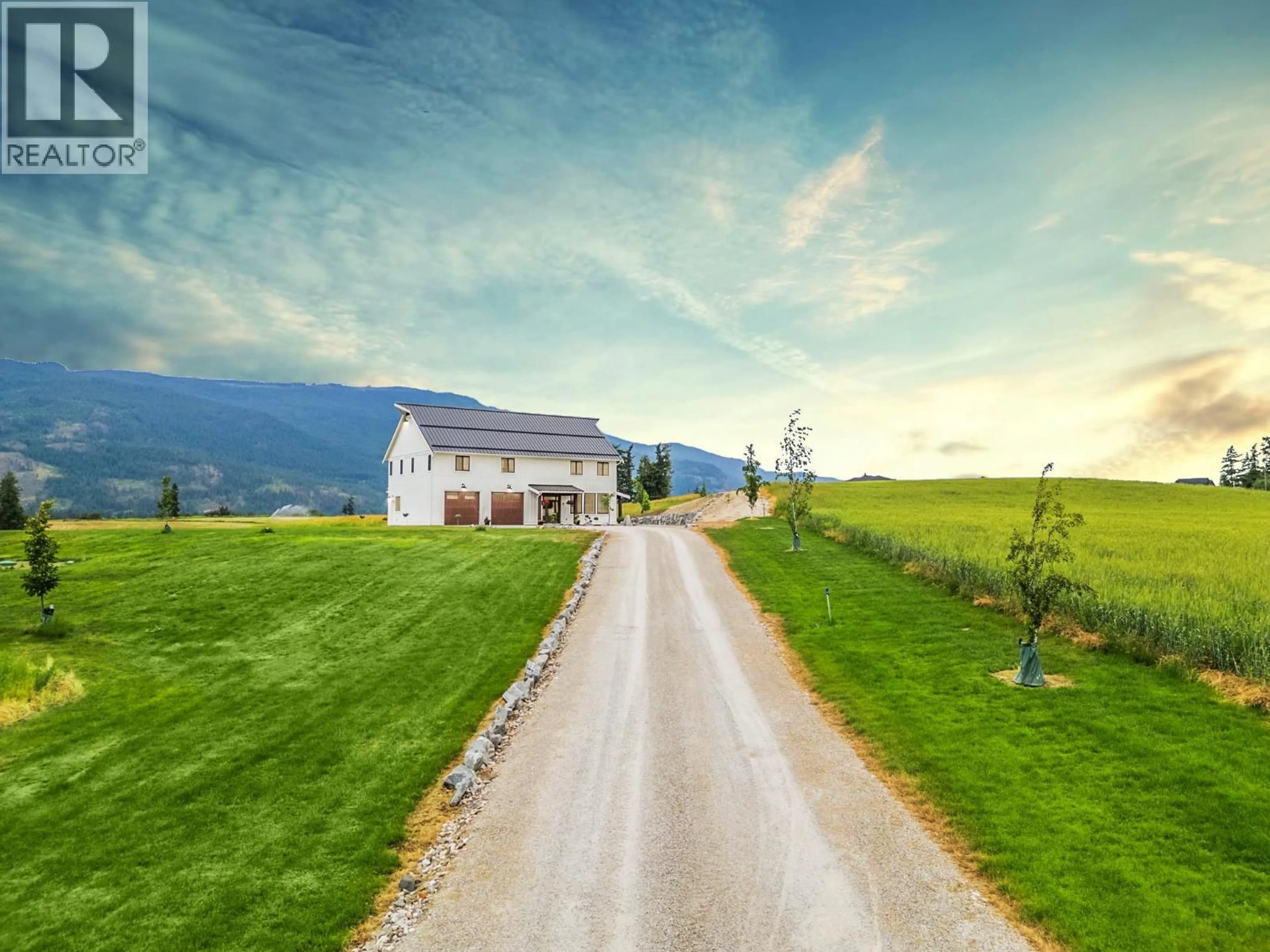 A pic from outside/outdoor area/front of a property/back of a property/a pic from drone, mountain view for 2589 YOUNG ROAD, Spallumcheen British Columbia V4Y0L3